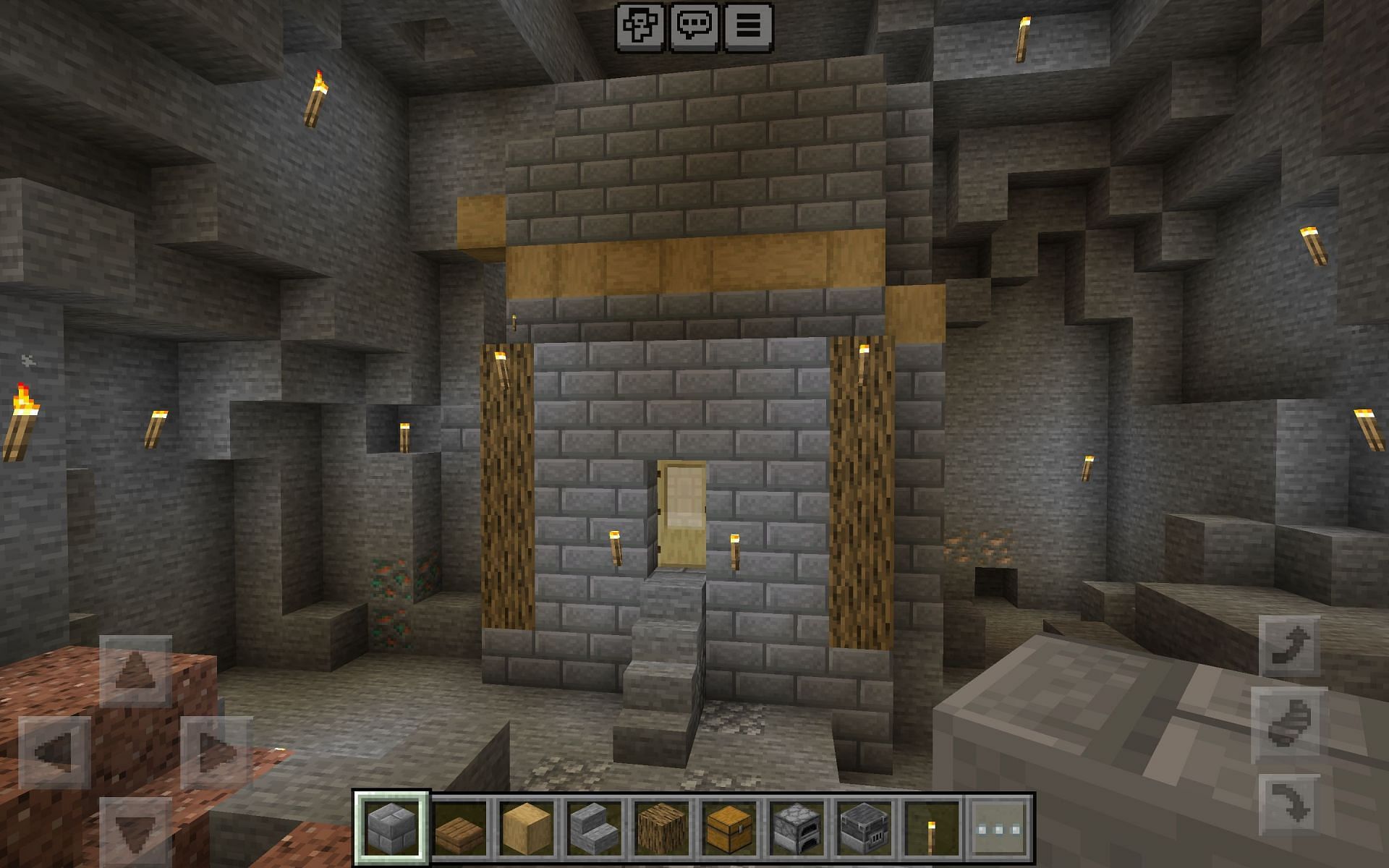 Building a vertical cave house saves space (Image via Mojang Studios)