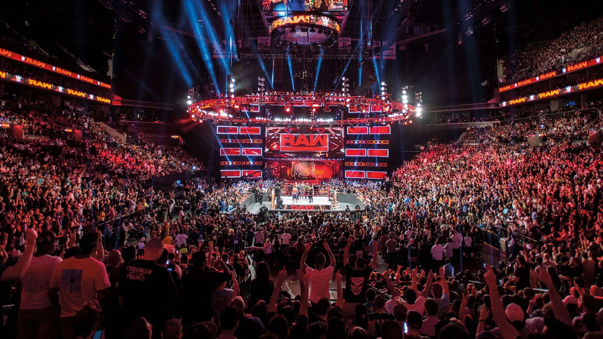 The WWE RAW logo and stage/set on display inside arena