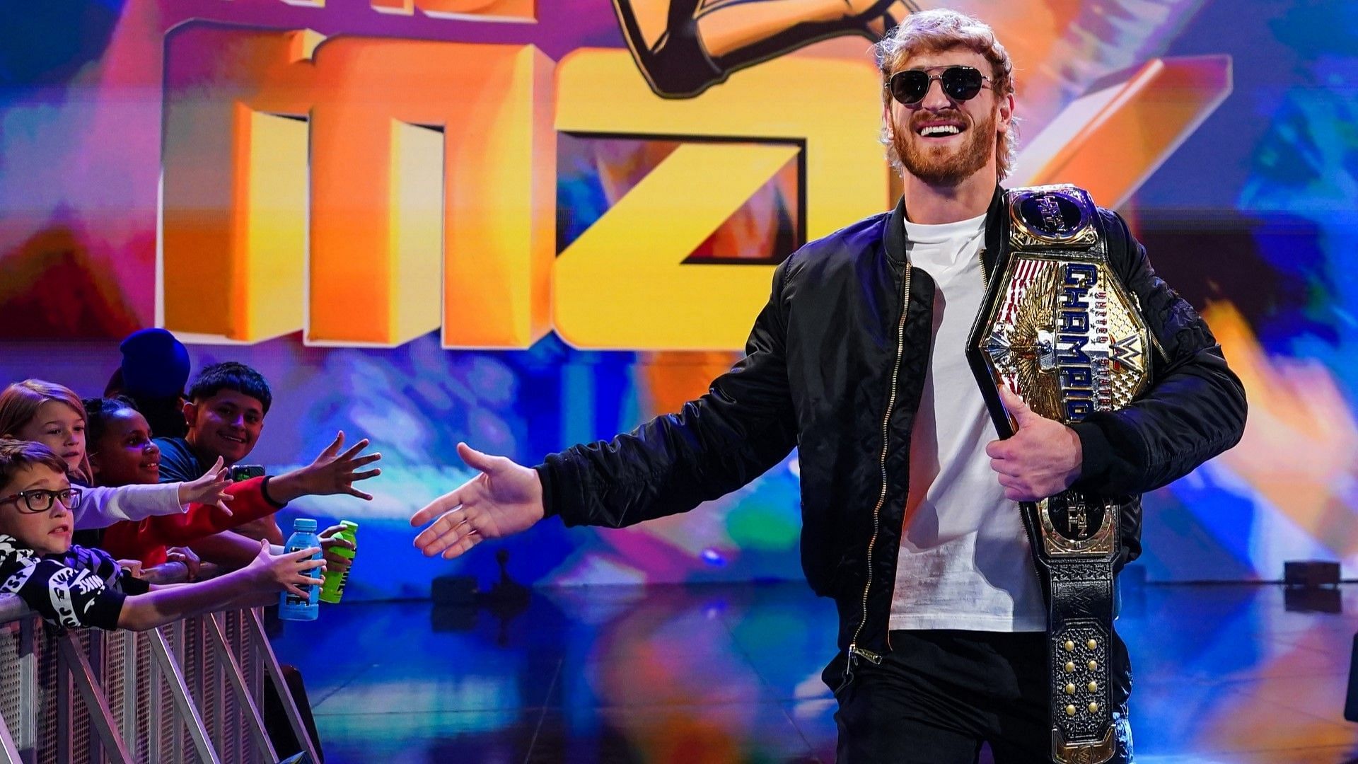 Logan Paul heads to the ring with the WWE United States Championship