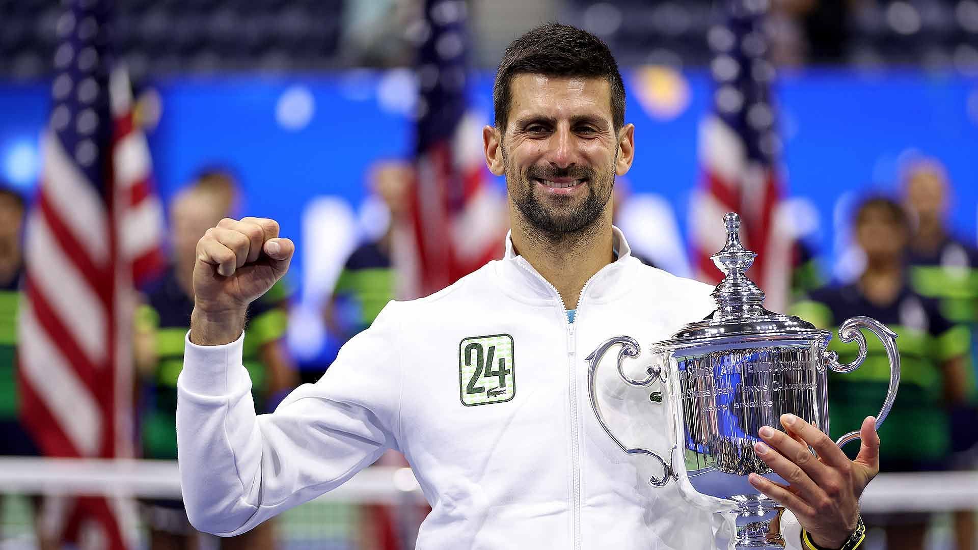 Novak Djokovic poses with the 2023 US Open trophy