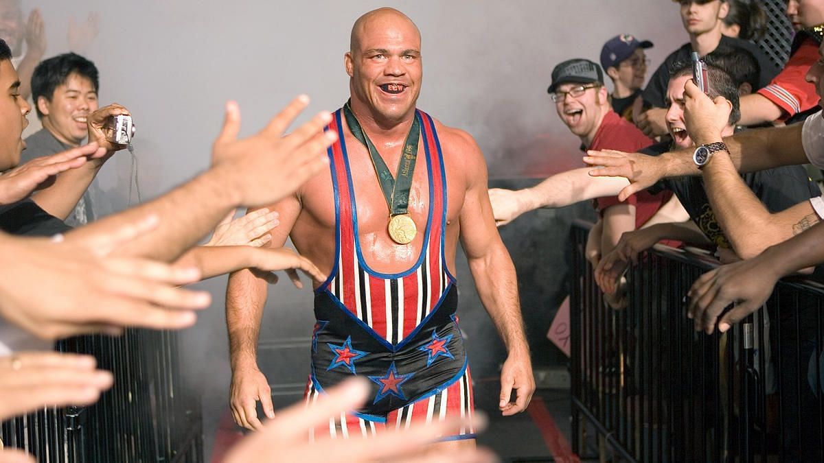 Kurt Angle makes his entrance through a raucous crowd