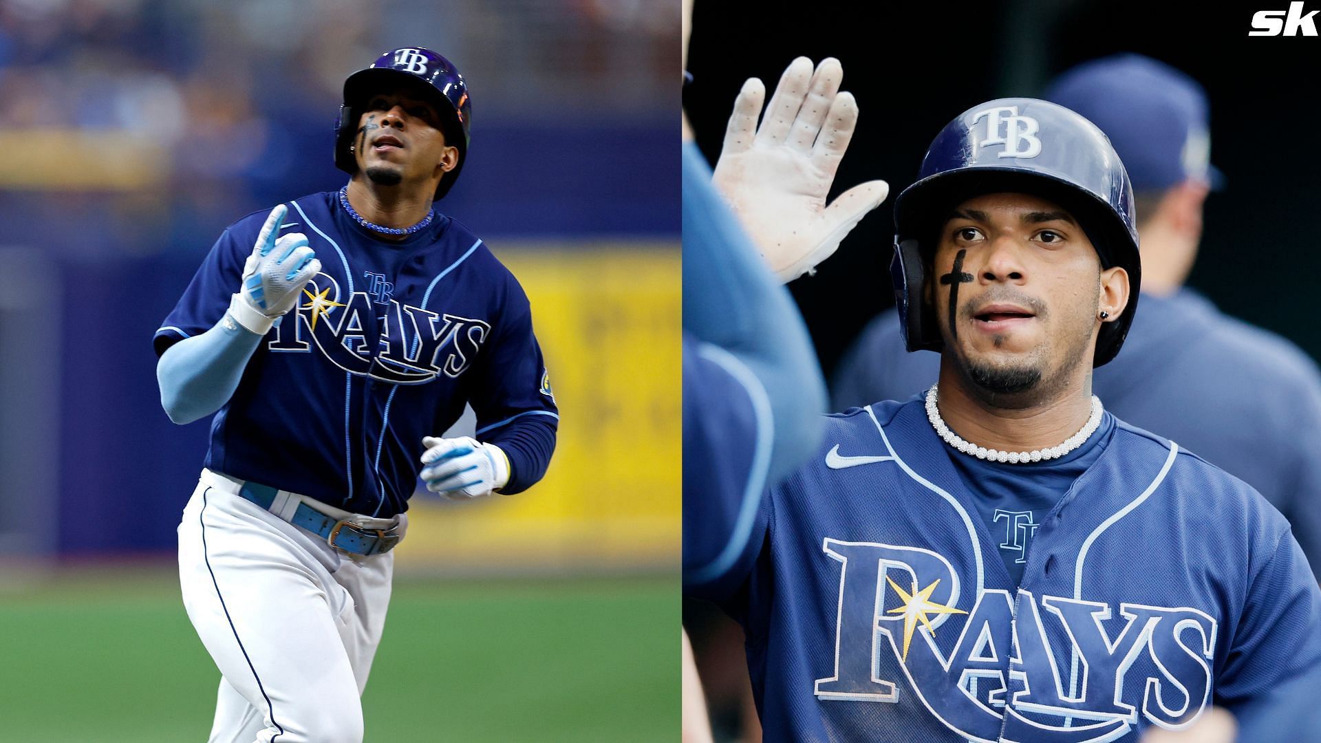 Wander Franco of the Tampa Bay Rays celebrates in the dugout after scoring against the Detroit Tigers at Comerica Park