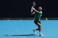 Karen Khachanov plays a backhand against Daniel Altmaier