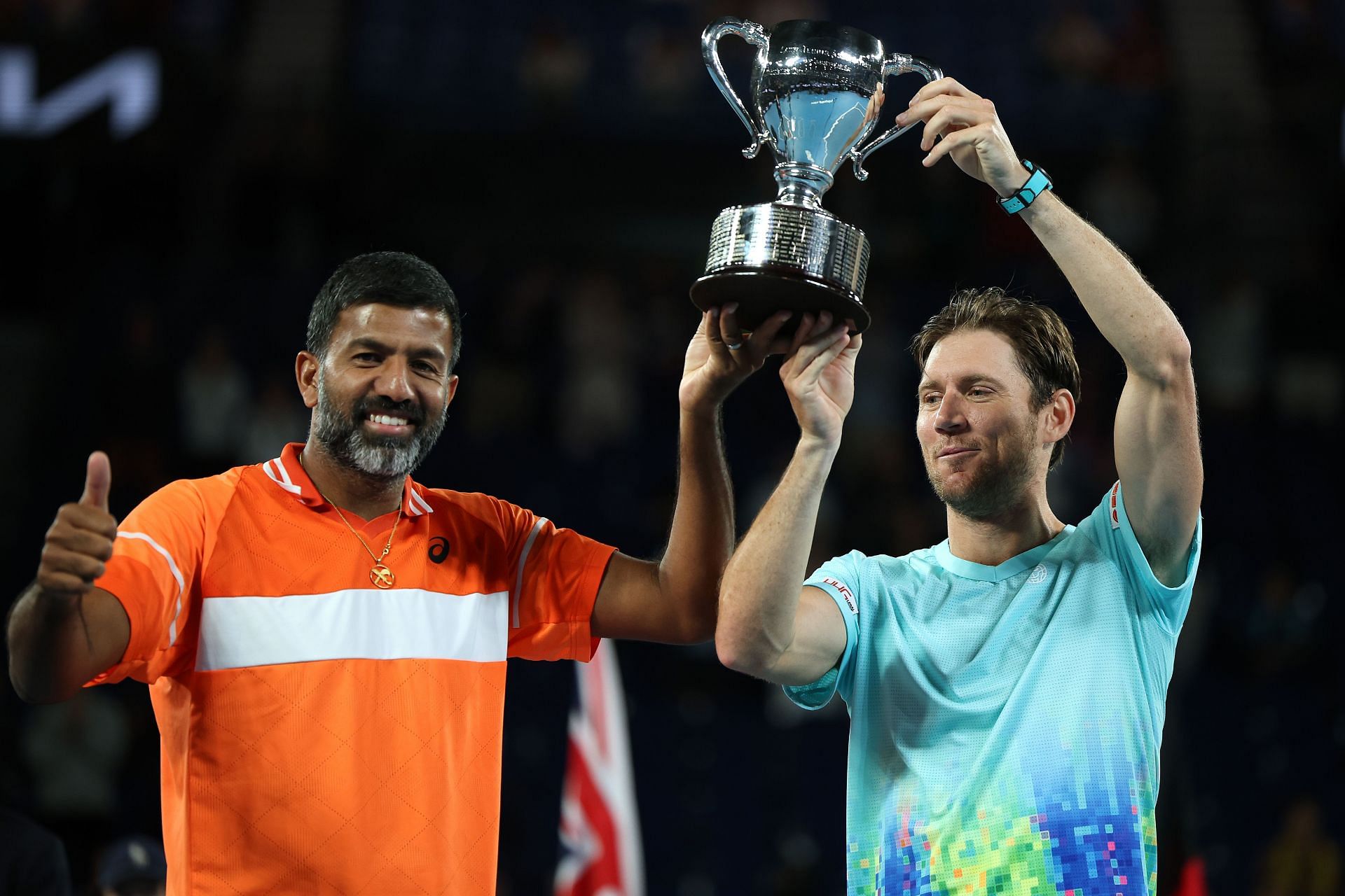 Rohan Bopanna and Matthew Ebden with the men's doubles trophy at the Australian Open