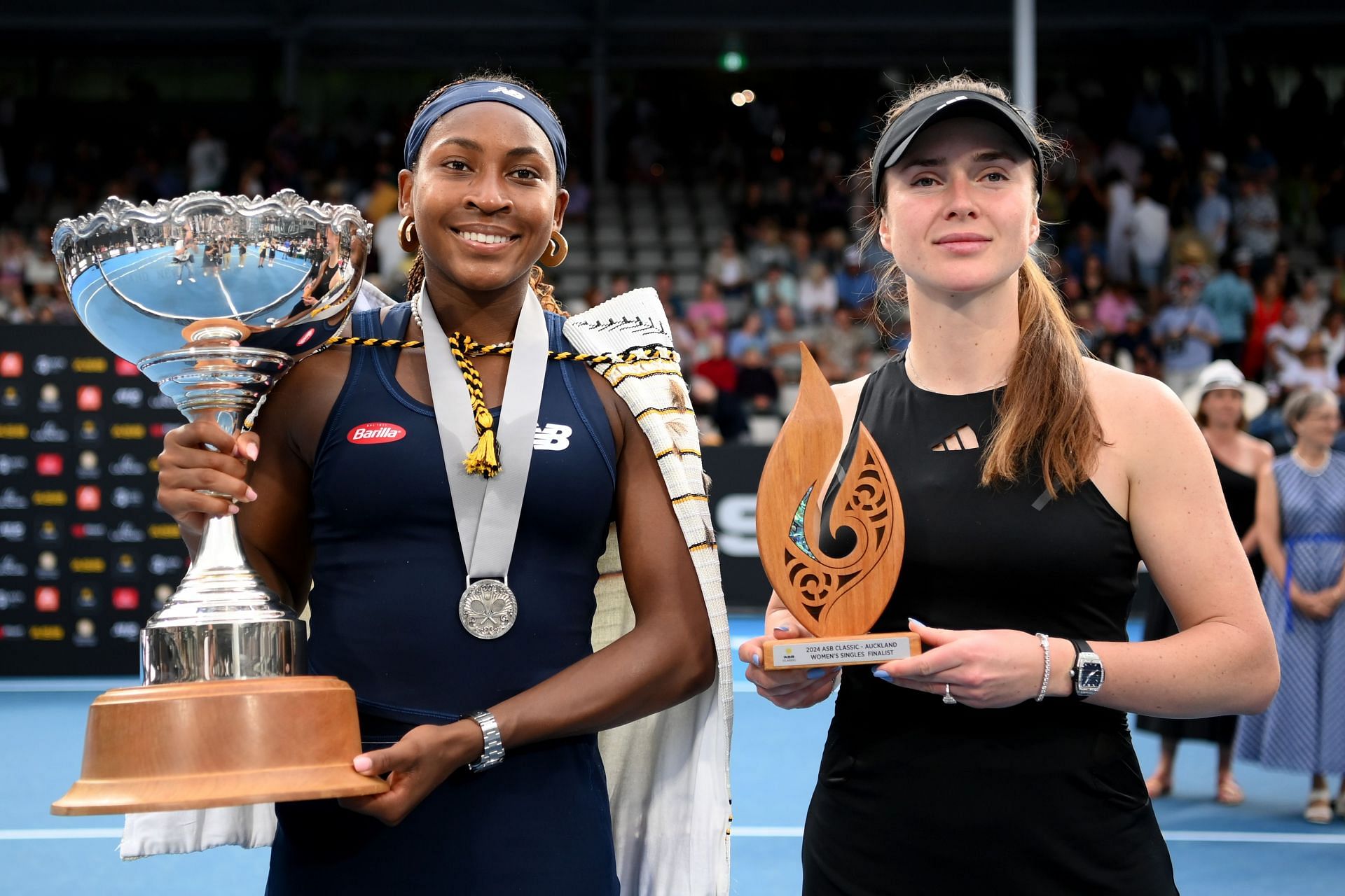 Coco Gauff and Elina Svitolina pictured with their ASB Classic trophies