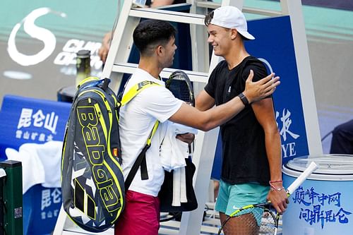 Carlos Alcaraz and Holger Rune during a practice session at the China Open