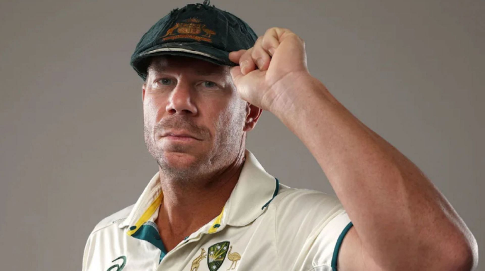 David Warner poses proudly with his Baggy Green