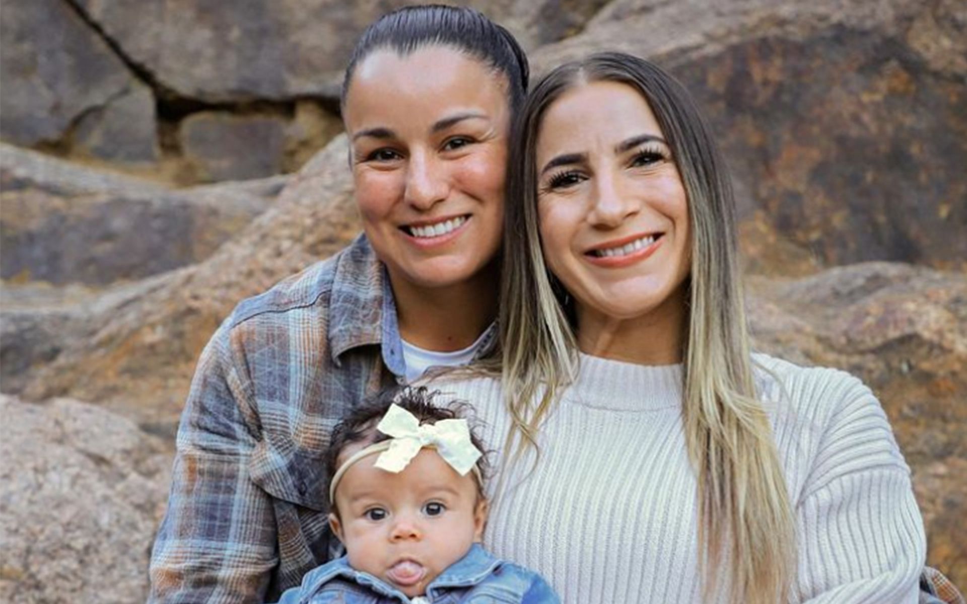 Raquel Pennington (left) with her spouse Tecia Torres (right) and daughter (Image Courtesy: @raquel_pennington Instagram)