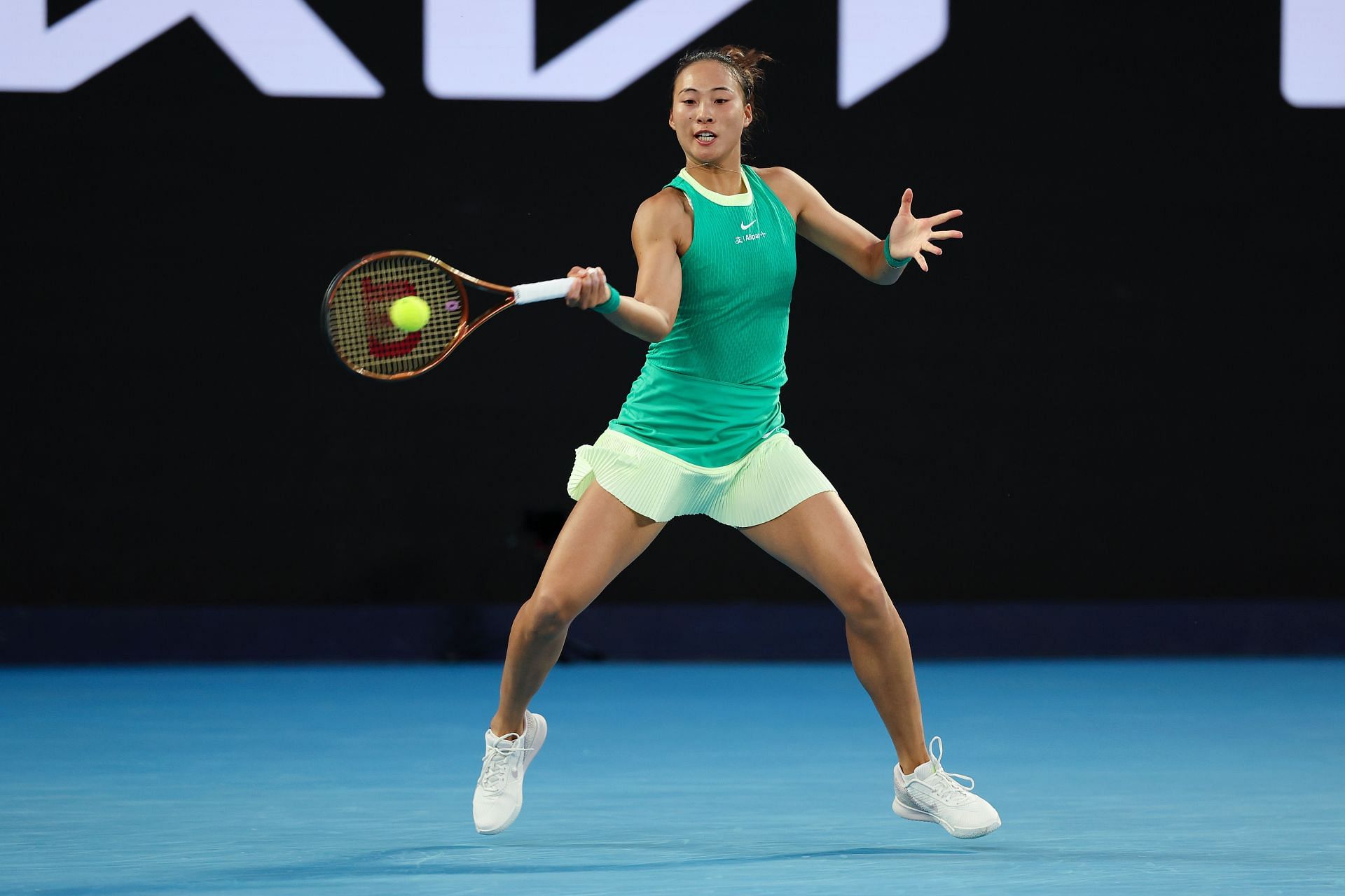Qinwen Zheng in action at the 2024 Australian Open
