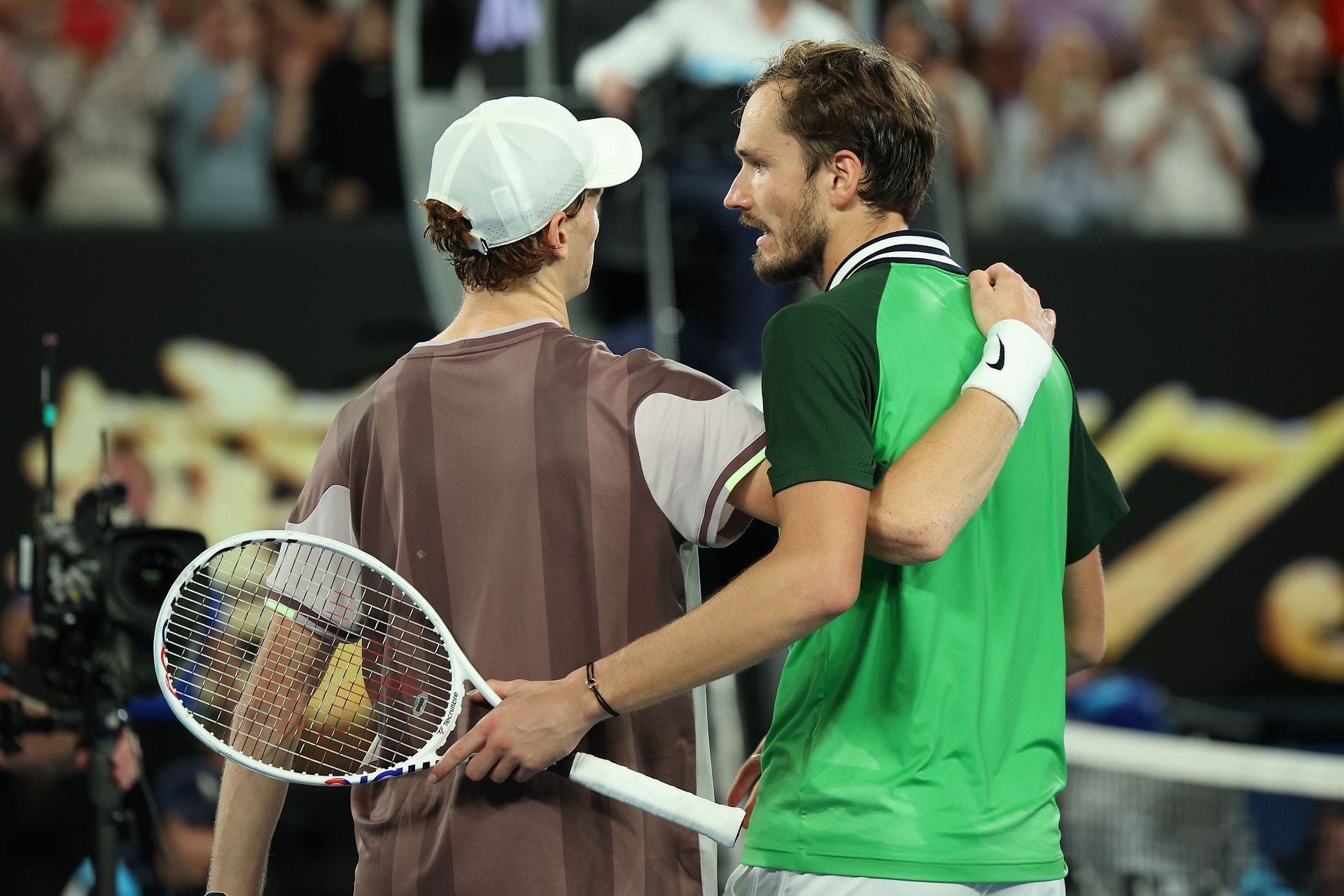 Daniil Medvedev greets Sinner at the net after the Australian Open final
