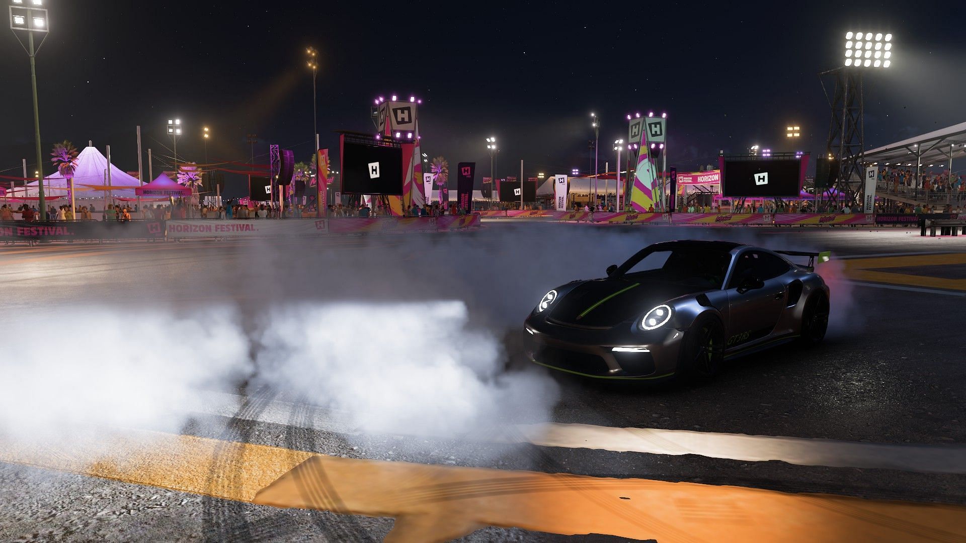 A Porsche doing a spin in front of the festival crowd (Image via Playground Games)