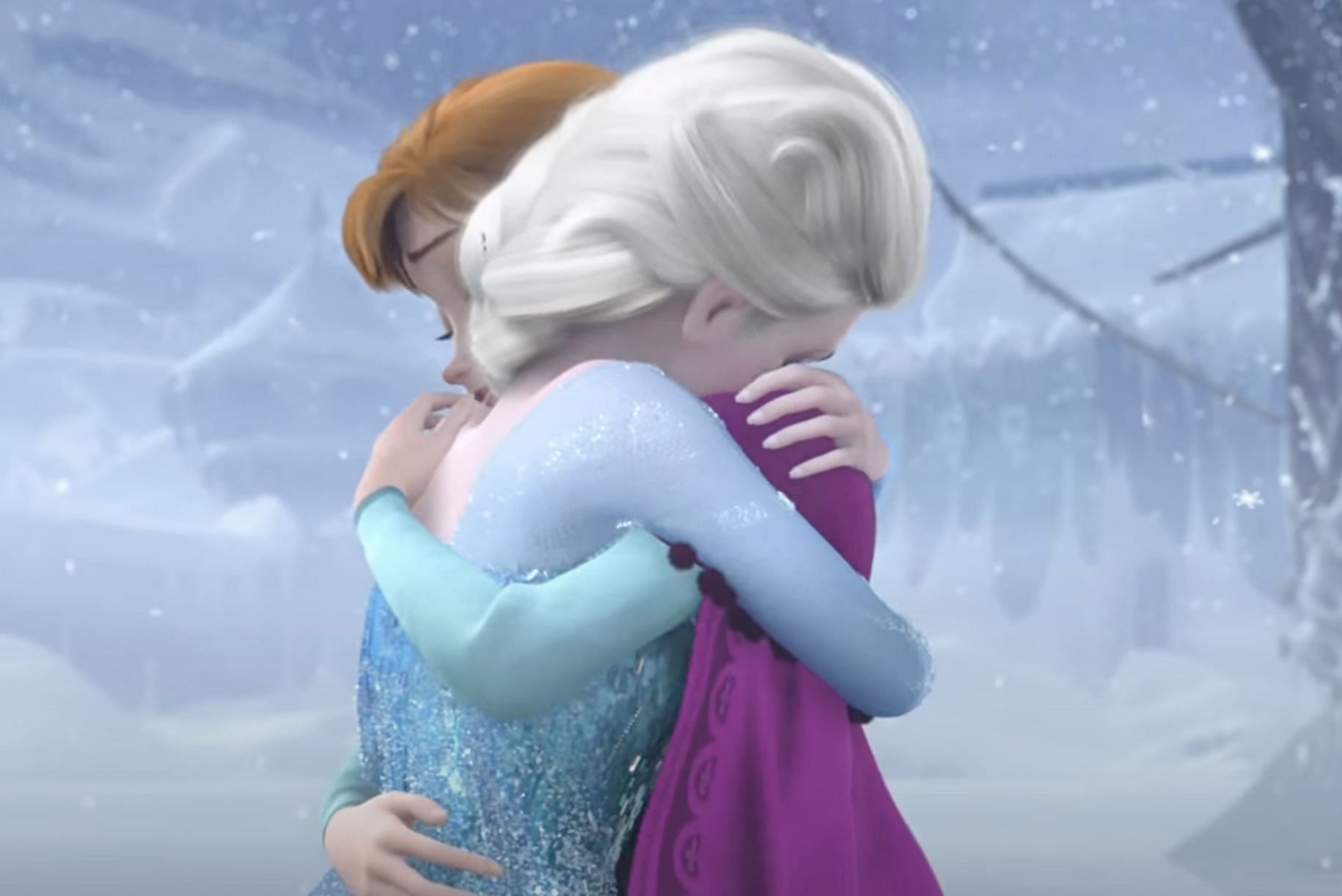 A still of Elsa and Anna hugging. (Image via Disney)