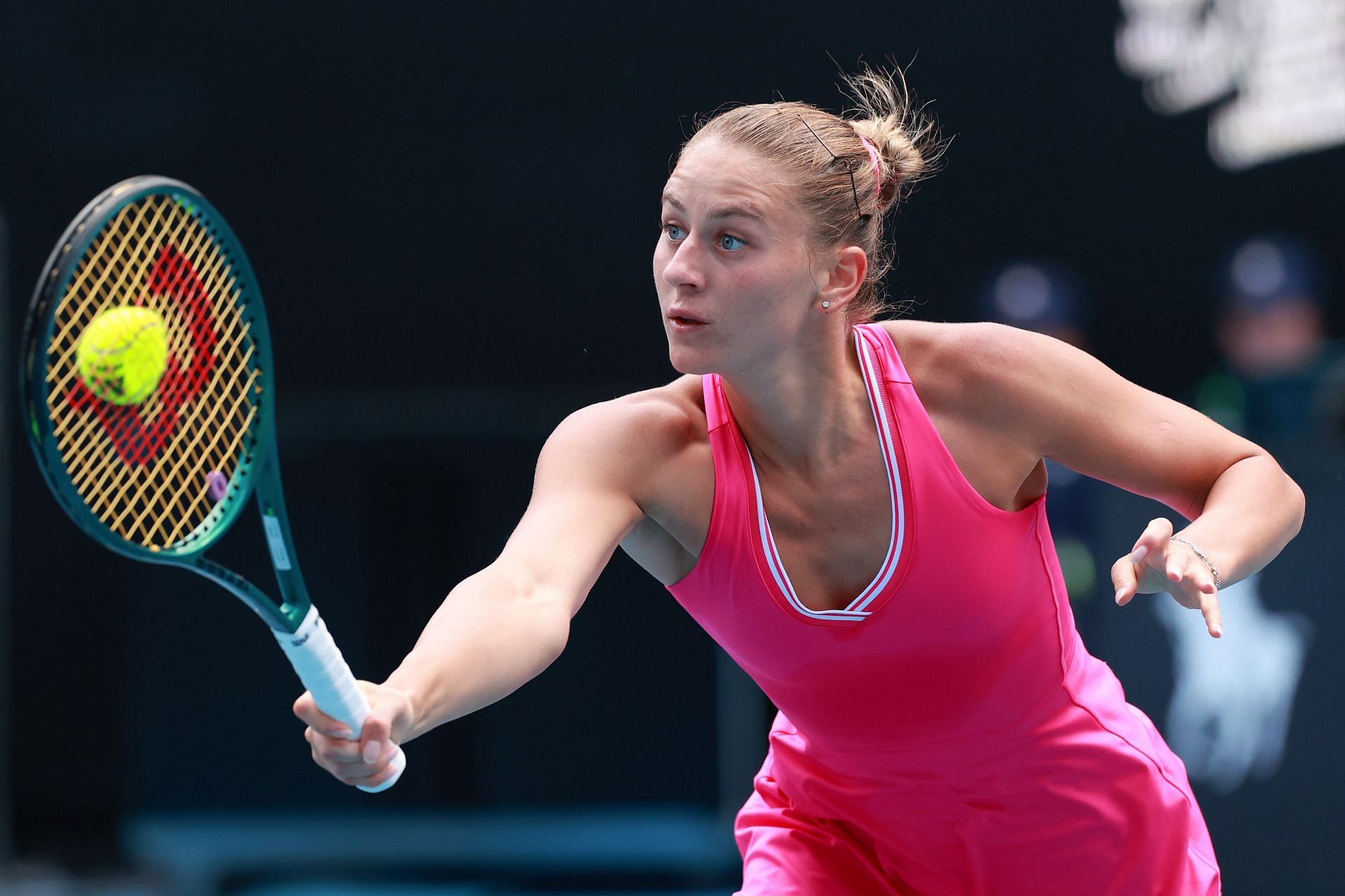 Marta Kostyuk hits a volley against Maria Timofeeva