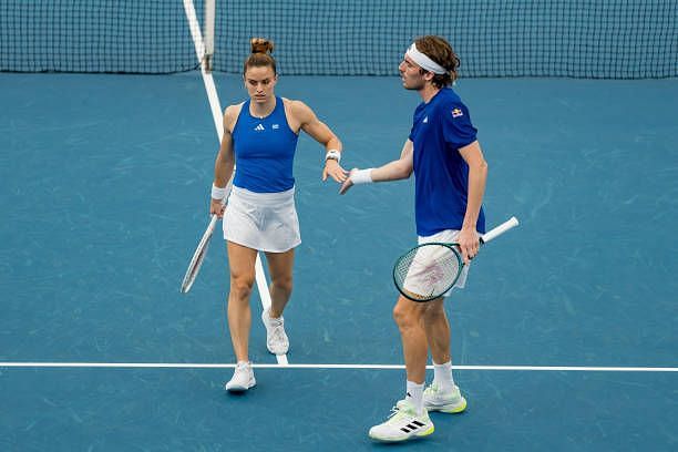 Maria Sakkari and Stefanos Tsitsipas of Team Greece compete in the Group B doubles match against Tomas Barrios Vera and Daniela Seguel of Team Chile...