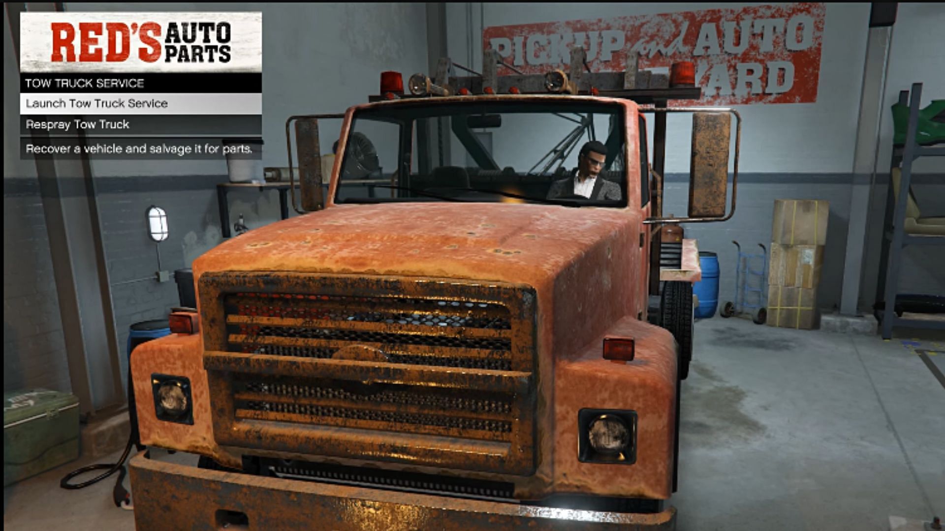 Select the Launch Tow Truck Service option here (Image via YouTube/Red Nitrate)