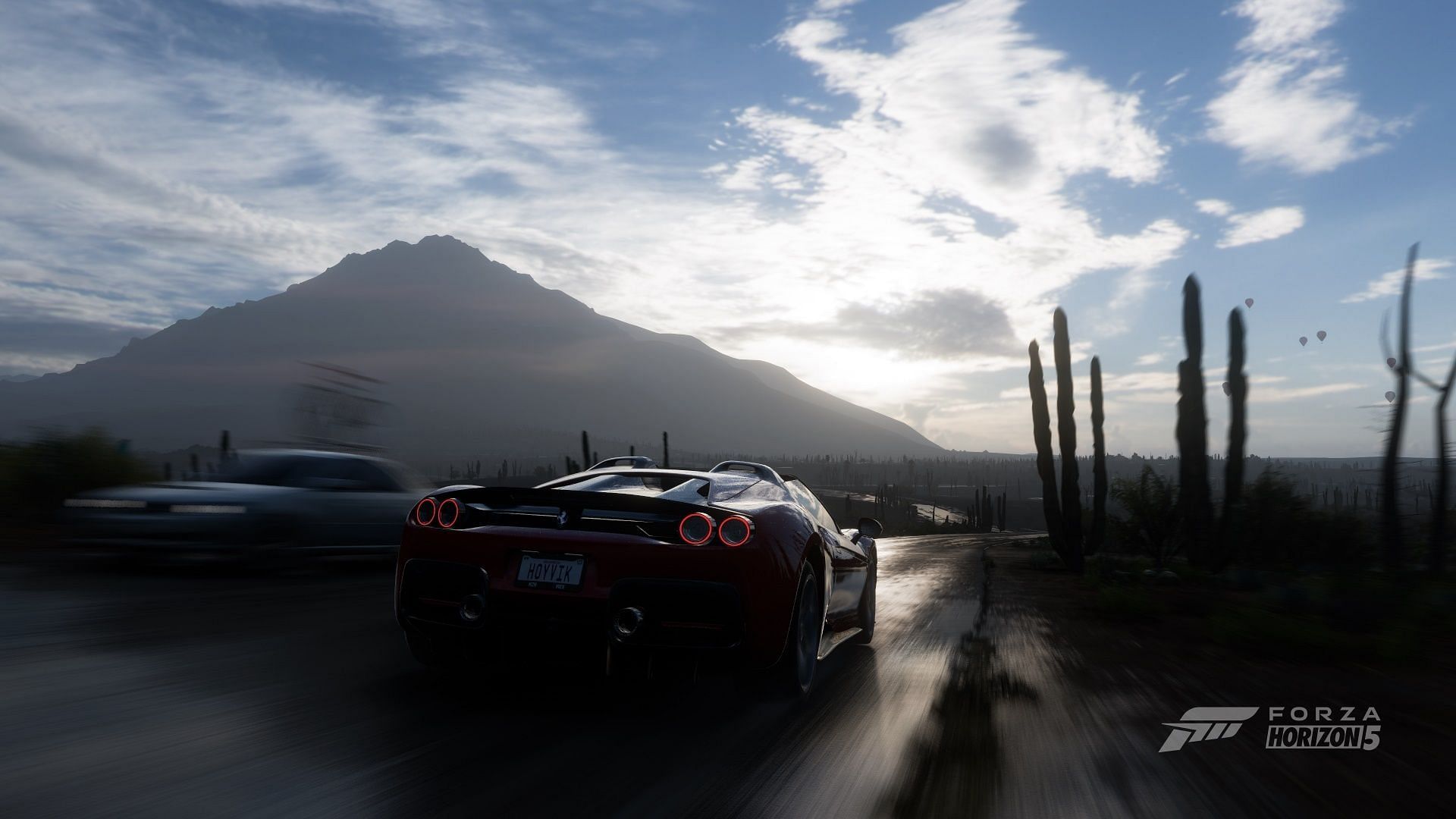 Driving a Ferrari through the sandy shores of Forza Horizon 5.