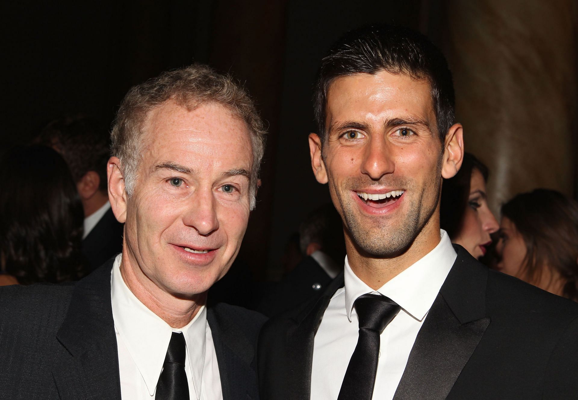 John McEnroe and Novak Djokovic