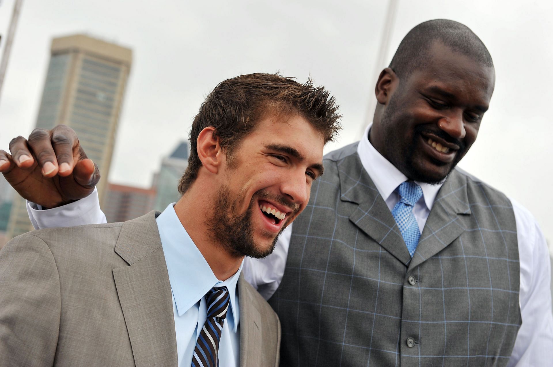 Michael Phelps and basketball star Shaquille O&#039;Neal pose for pictures after a press conference for O&#039;Neal&#039;s reality TV series &quot;Shaq Vs&quot; at the Rusty Scupper Restaurant on August 22, 2009 in Baltimore, Maryland.