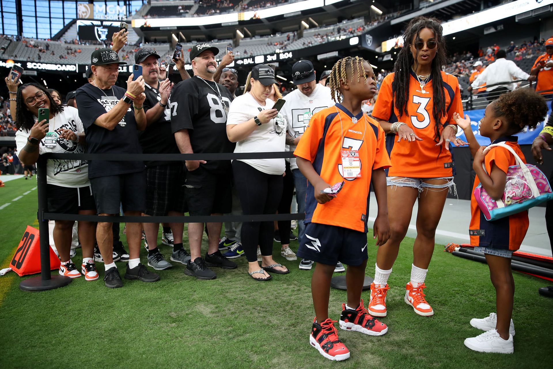 Ciara with the kids at a Denver Broncos game last season