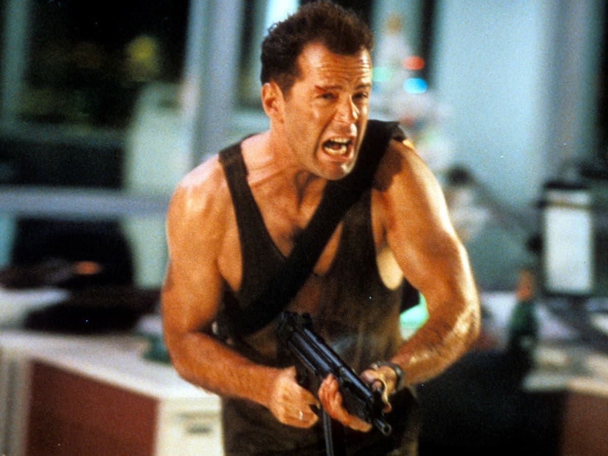 Bruce Willis in Die Hard (Image via 20th Century Fox)