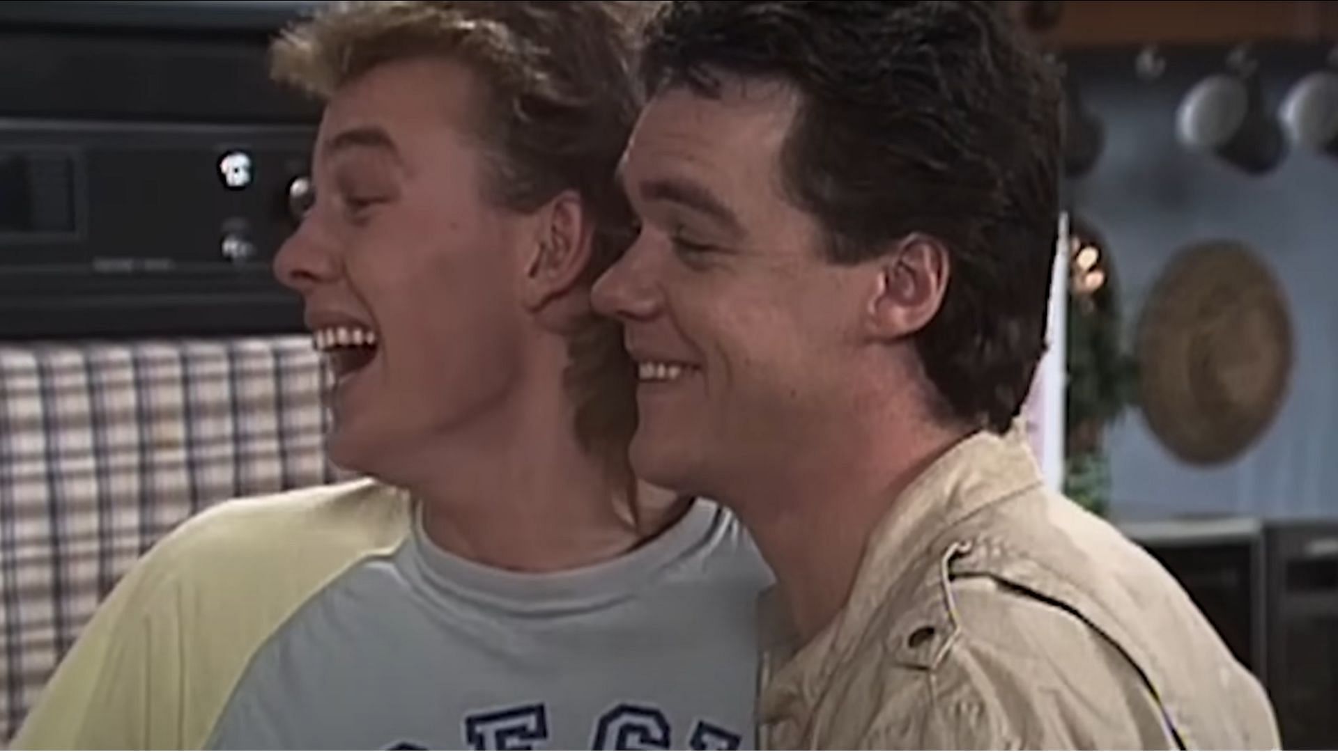 A scene featuring Jason Donovan and Stefan Dennis (Image via YouTube@Neighbours Official Channel)