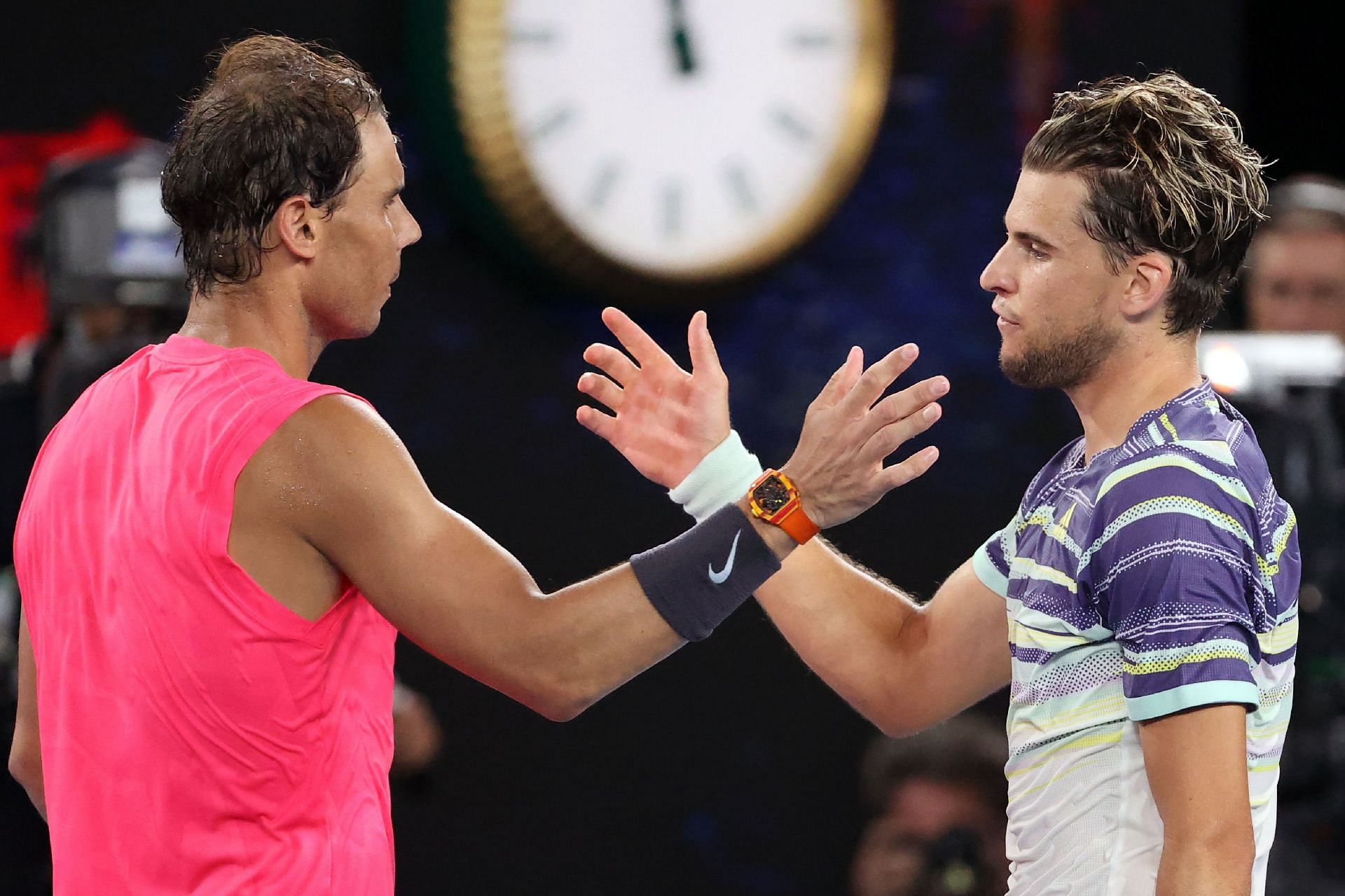 Rafael Nadal (L) and Dominic Thiem greet each other after their 2020 Australian Open clash