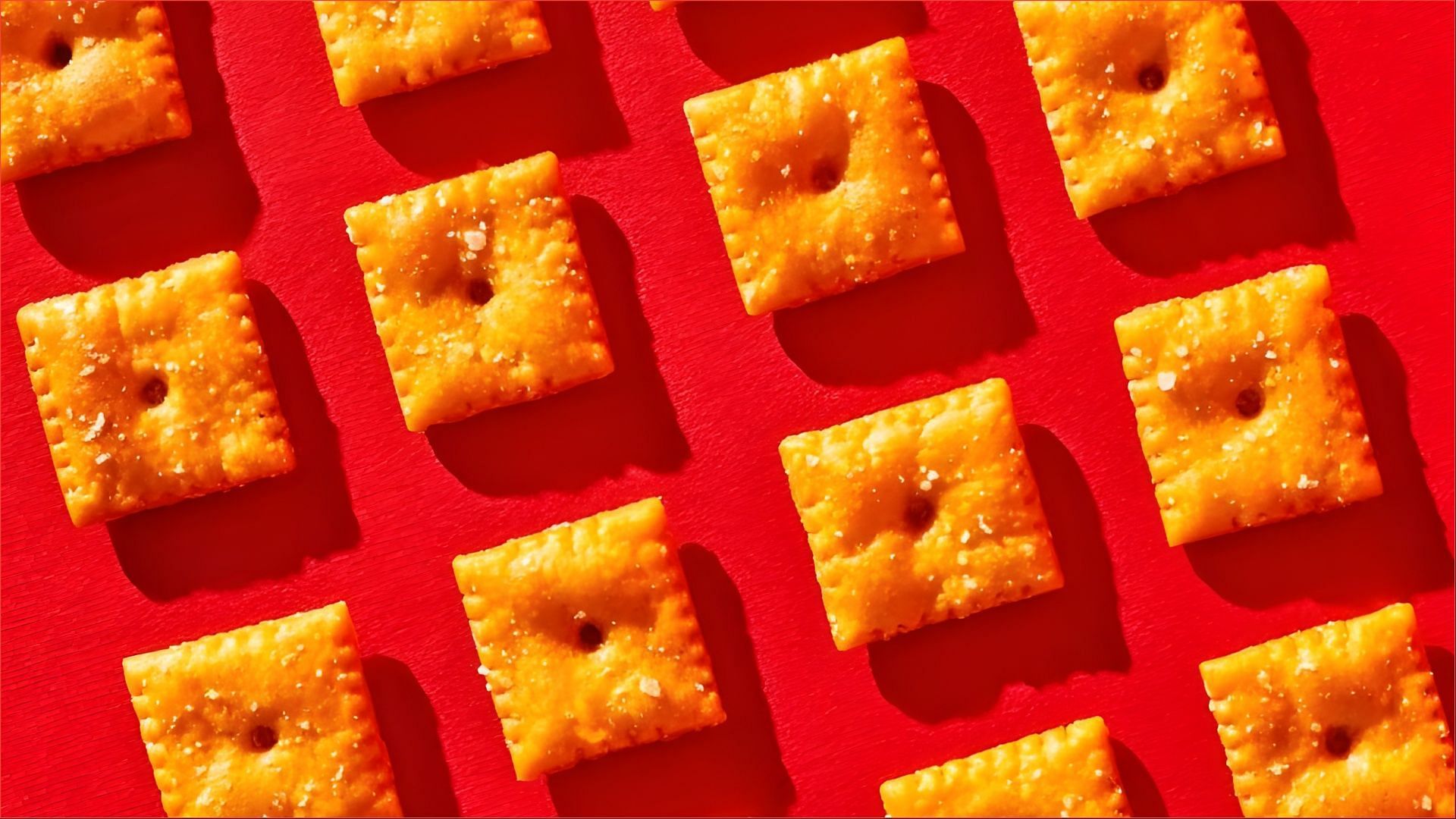 The new extra crunchy snacks come in Sharp White Cheddar and Bold Cheddar varieties (Image via Kellanova)