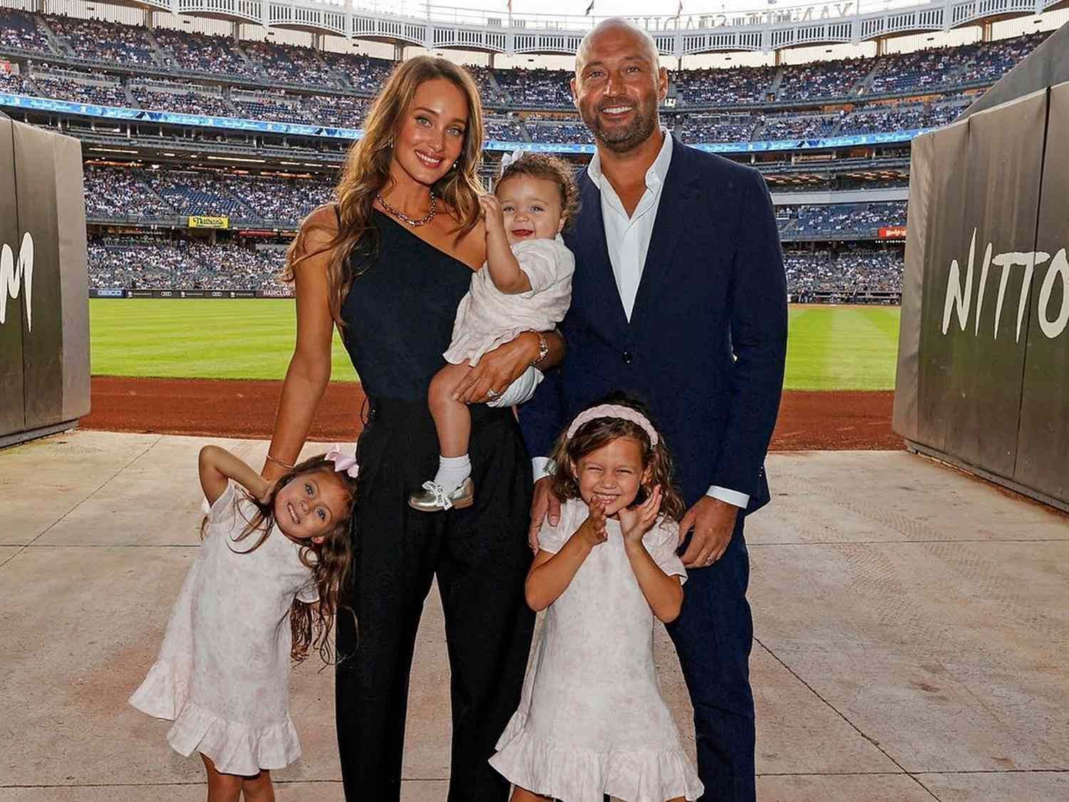 Derek Jeter with his wife Hannan and their three daughters
