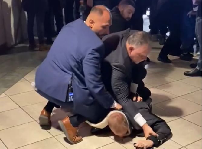 Watch: Leafs security guard knees fan on the head, causing bleeding
