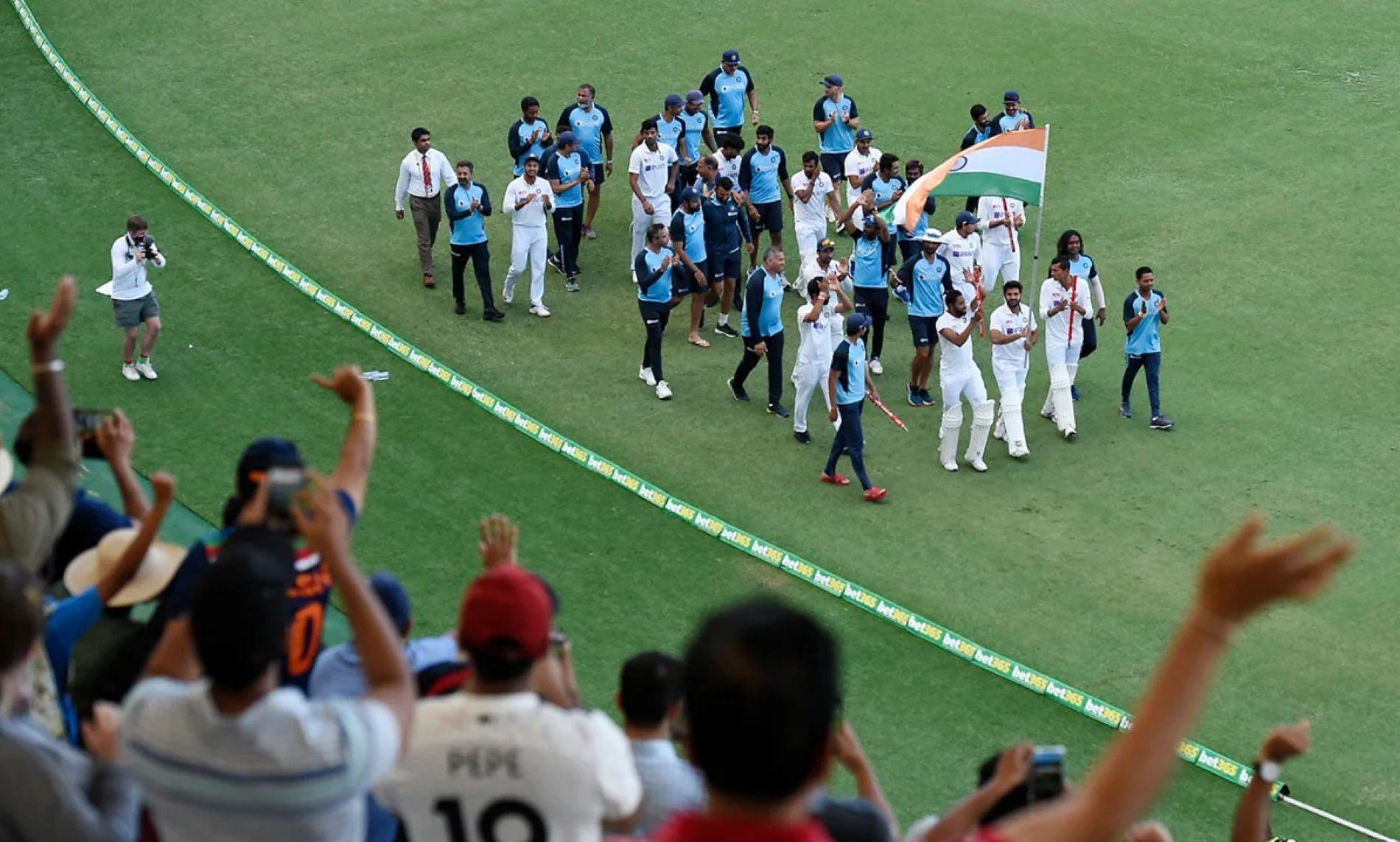 The Indian players did a lap of honor for the massive crowd at Brisbane.