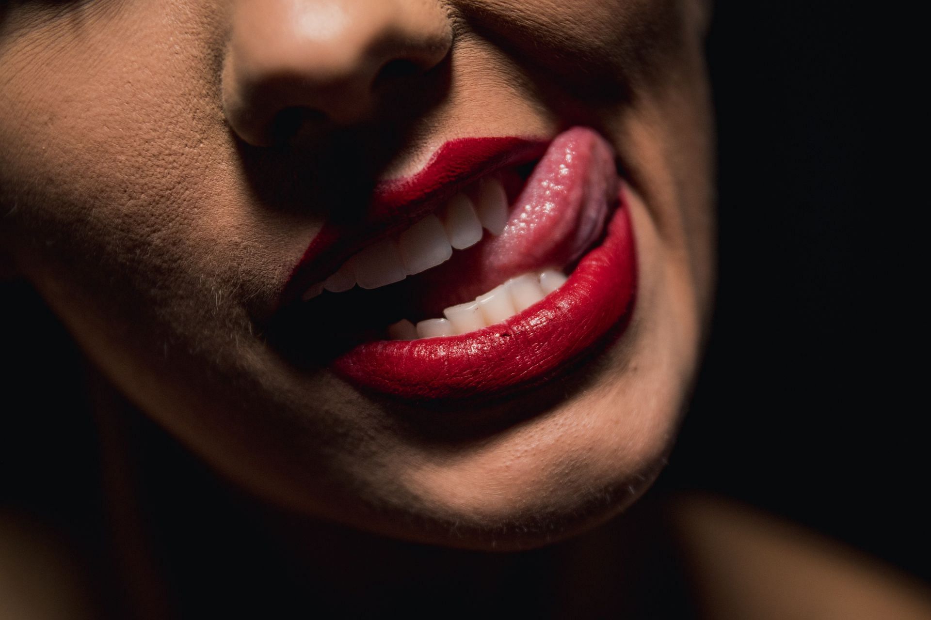 Accidental tongue bite (Image via Unsplash/ Joey Nicotra)
