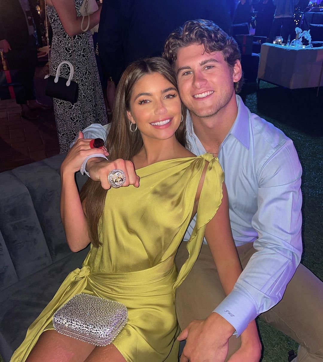 Sluss with her fianc&eacute;e and his Super Bowl ring