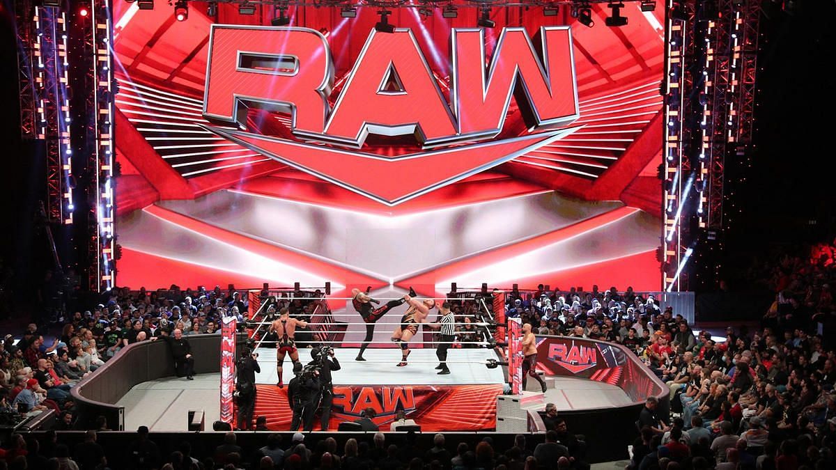 The WWE RAW ring and stage/set inside a packed arena
