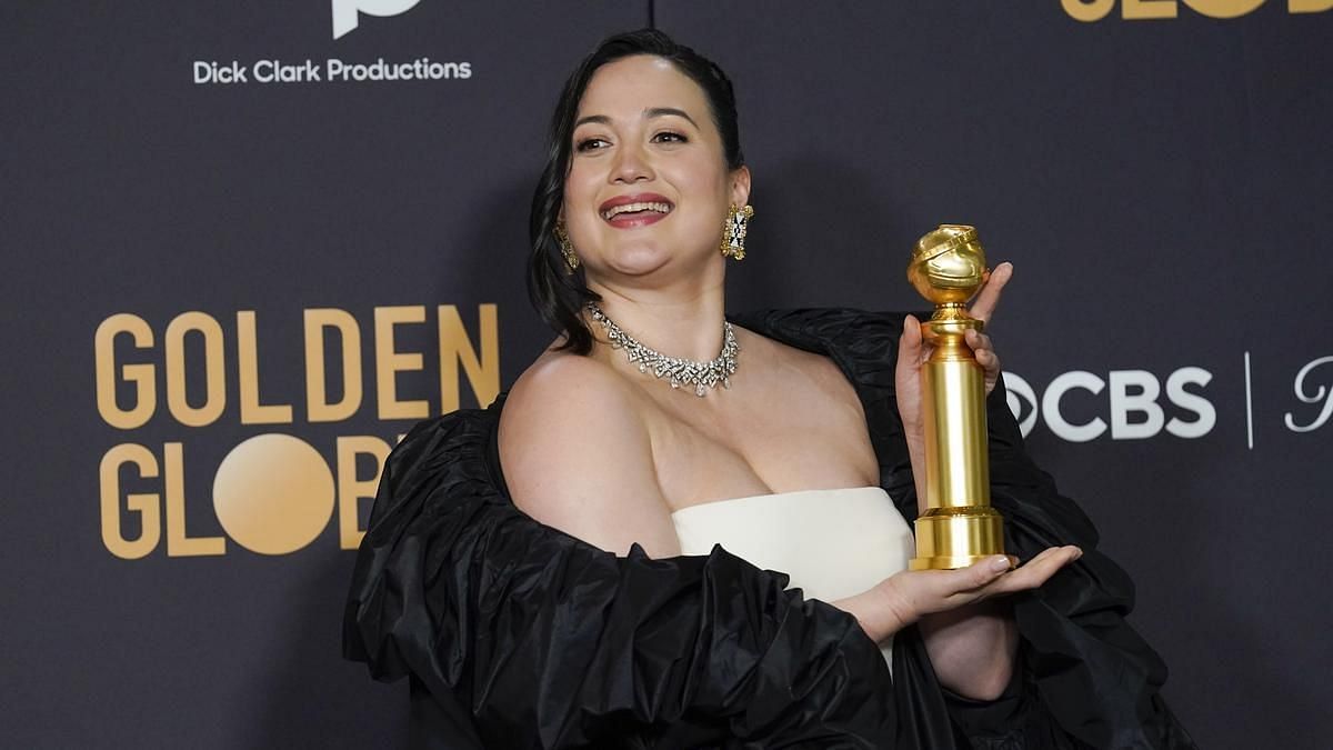 Gladstone with Best Actress Award at Golden Globes (Image via AP Photos)