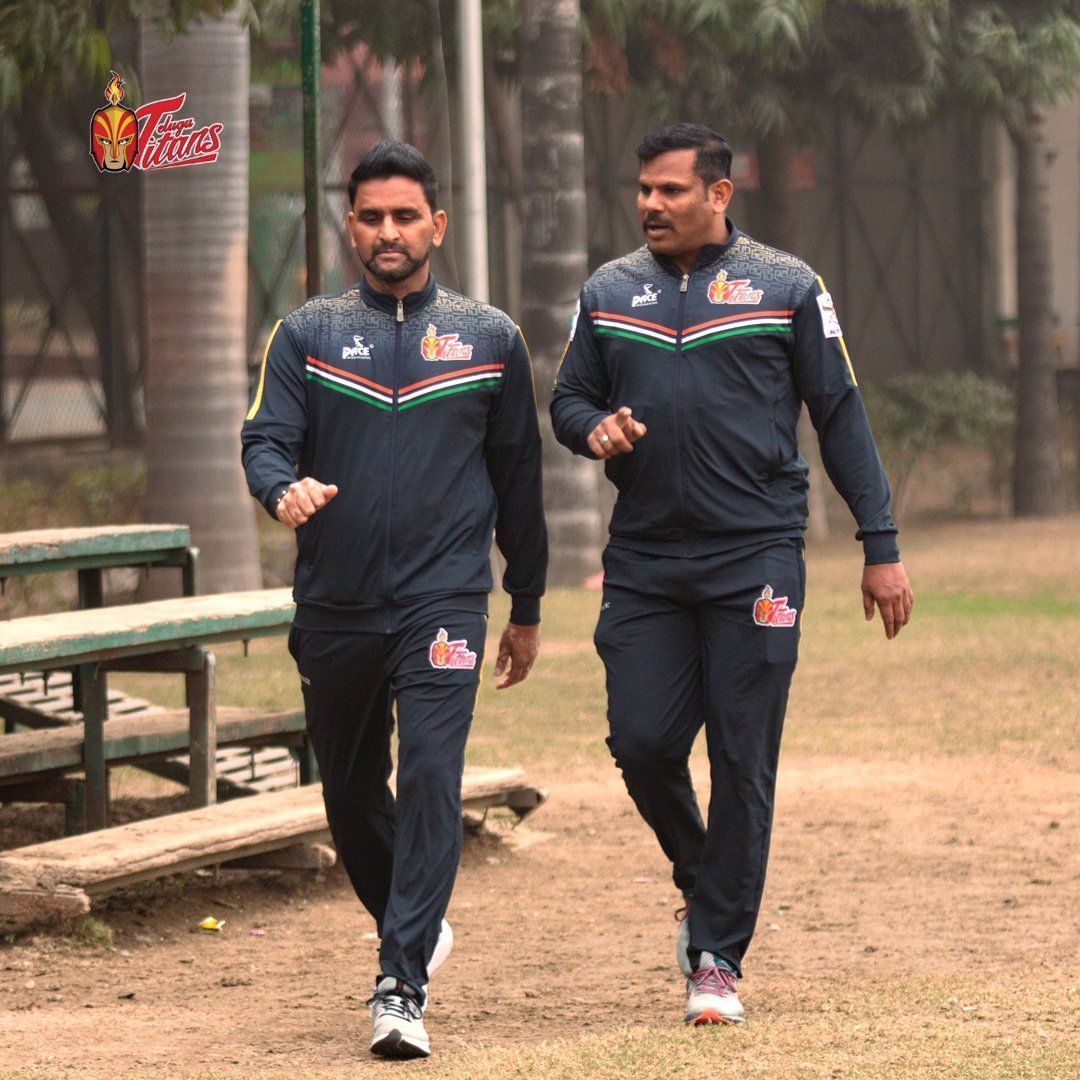 Telugu Titans&#039; head coach Srinivas Reddy (left).