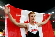 Shawn Barber of Canada celebrates after winning gold in the Men's Pole Vault final during day three of the 15th IAAF World Athletics Championships at Beijing National Stadium on August 24, 2015, in Beijing, China.