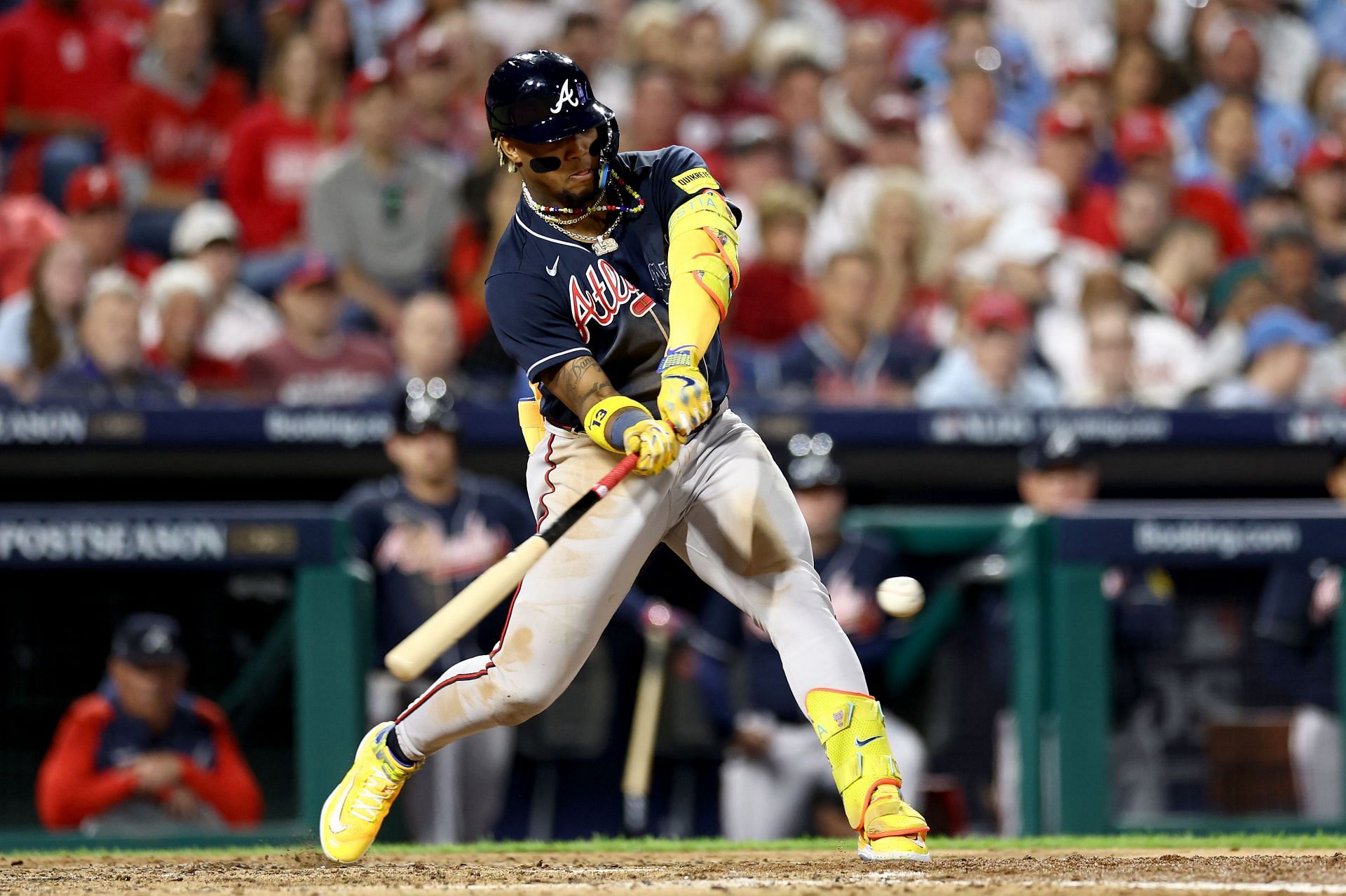  Ronald Acu&ntilde;a Jr. #13 of the Atlanta Braves hits a single against the Philadelphia Phillies during the fifth inning in Game Three of the Division Series at Citizens Bank Park 