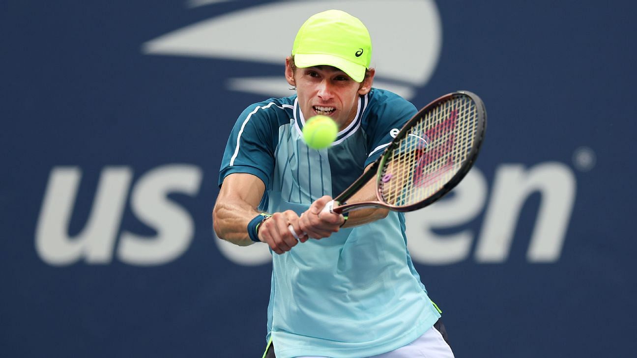 Alex de Minaur hits a backhand