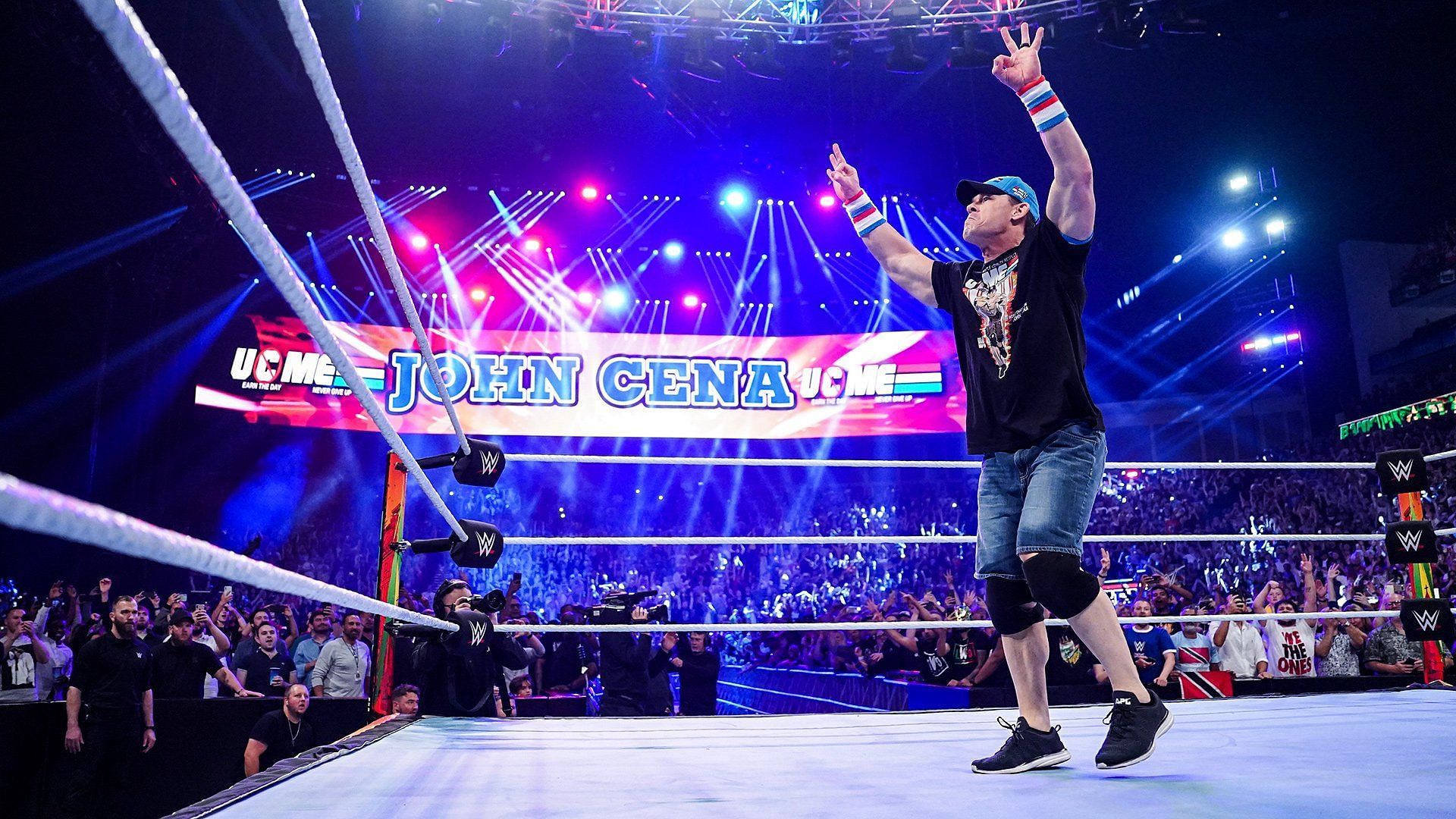 John Cena poses in the ring for the WWE Universe