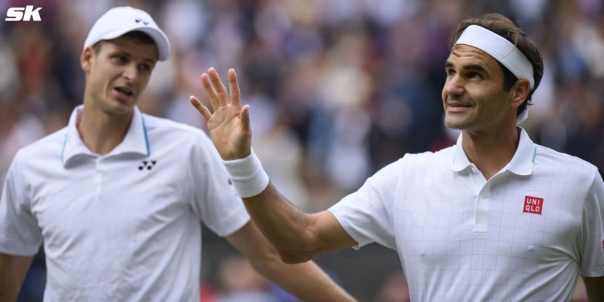 Hubert Hurkcaz(L) and Roger Federer