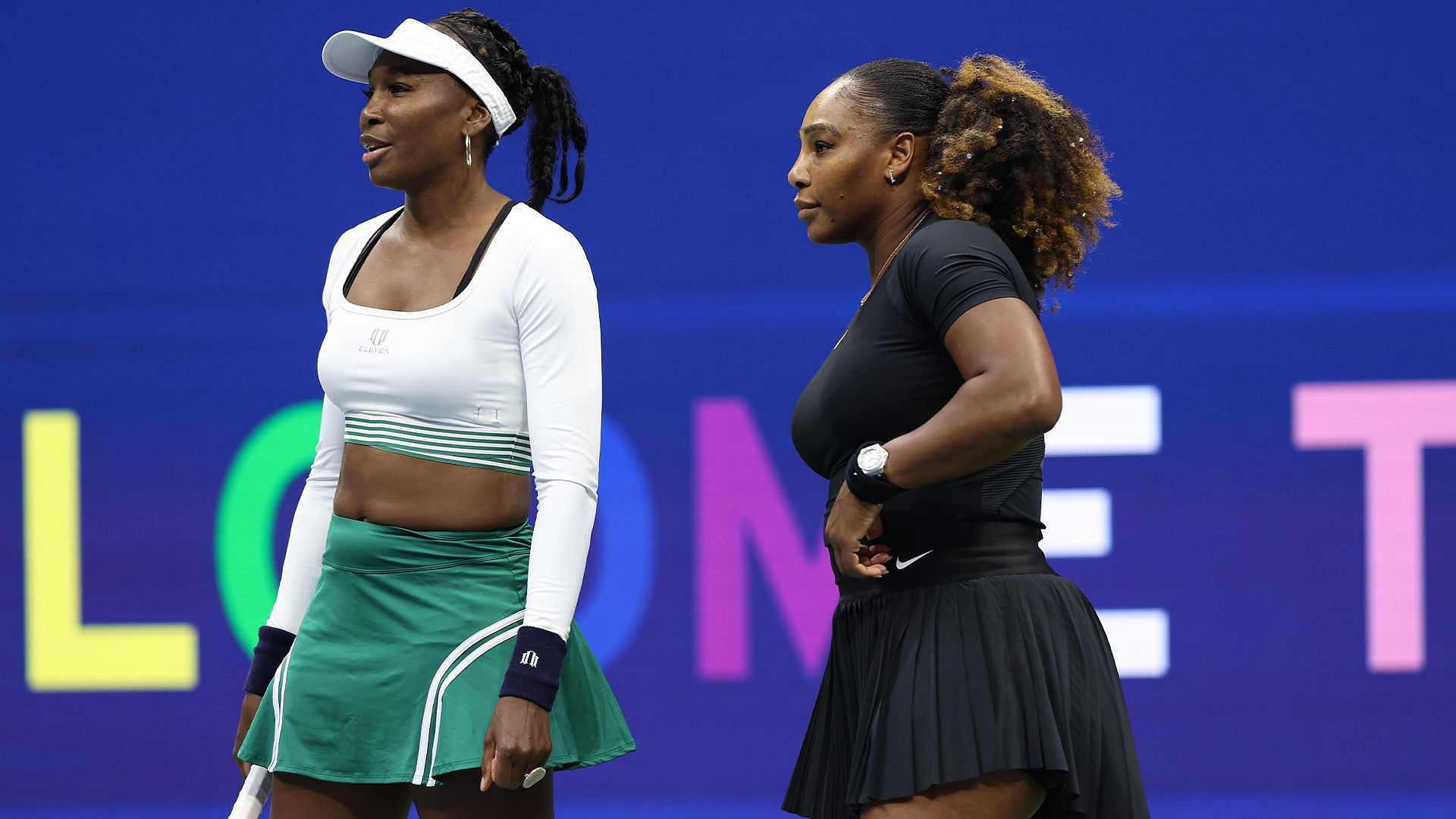 Serena Williams and Venus Williams in action on the tennis court 
