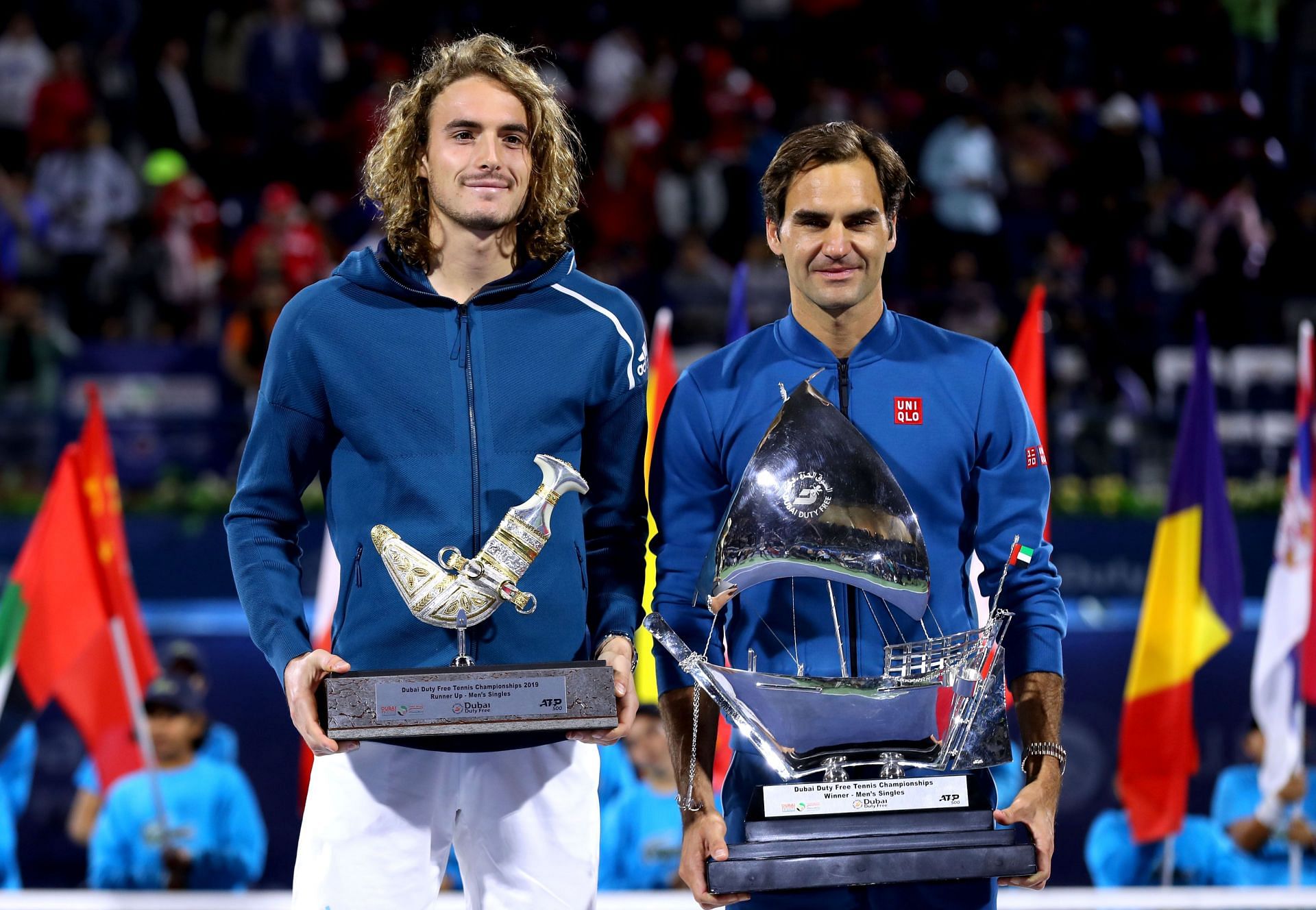 Stefanos Tsitsipas (L) and Roger Federer (R) at the 2019 Dubai Tennis Championships