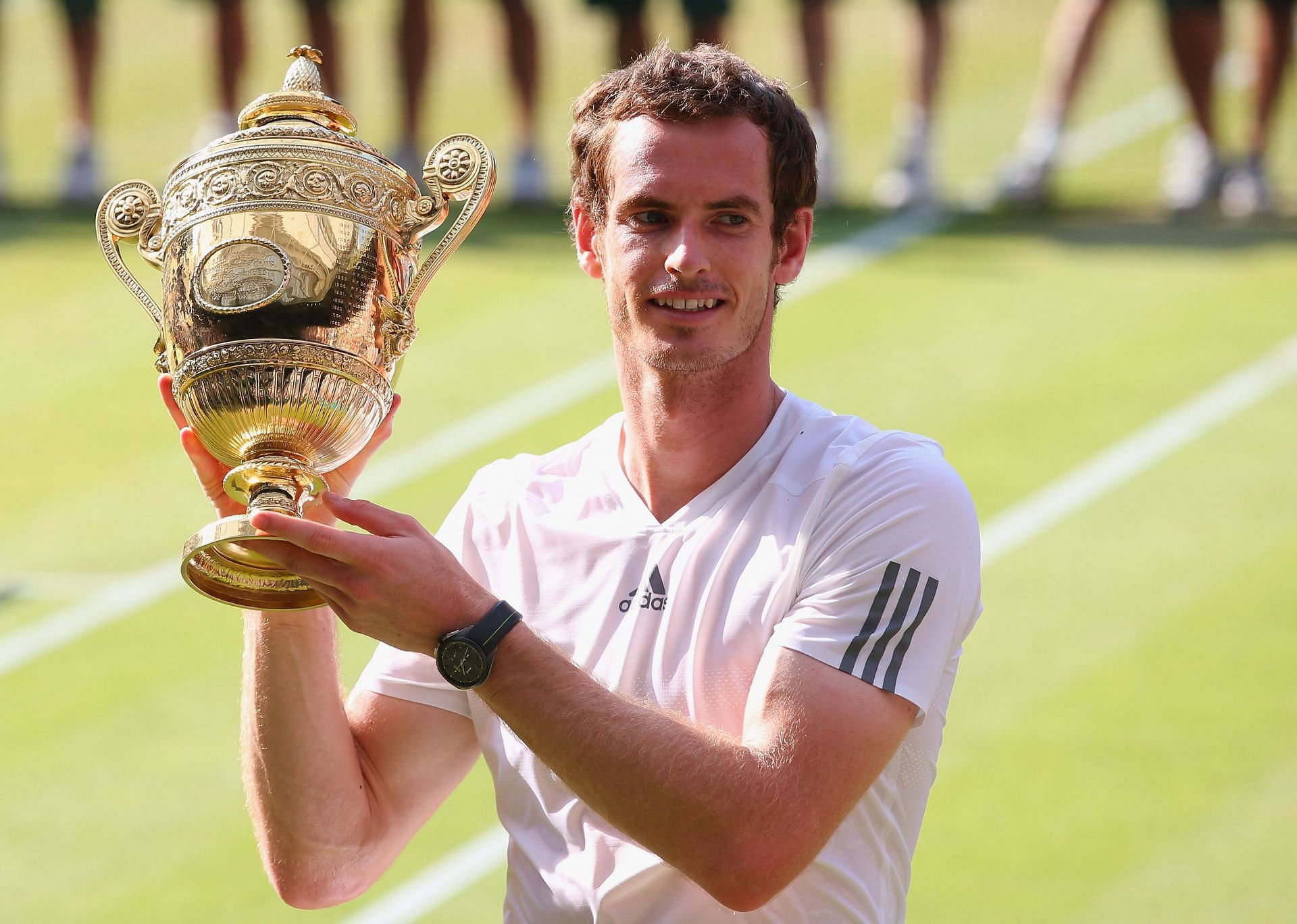 Murray pictured with the Wimbledon 2013 trophy