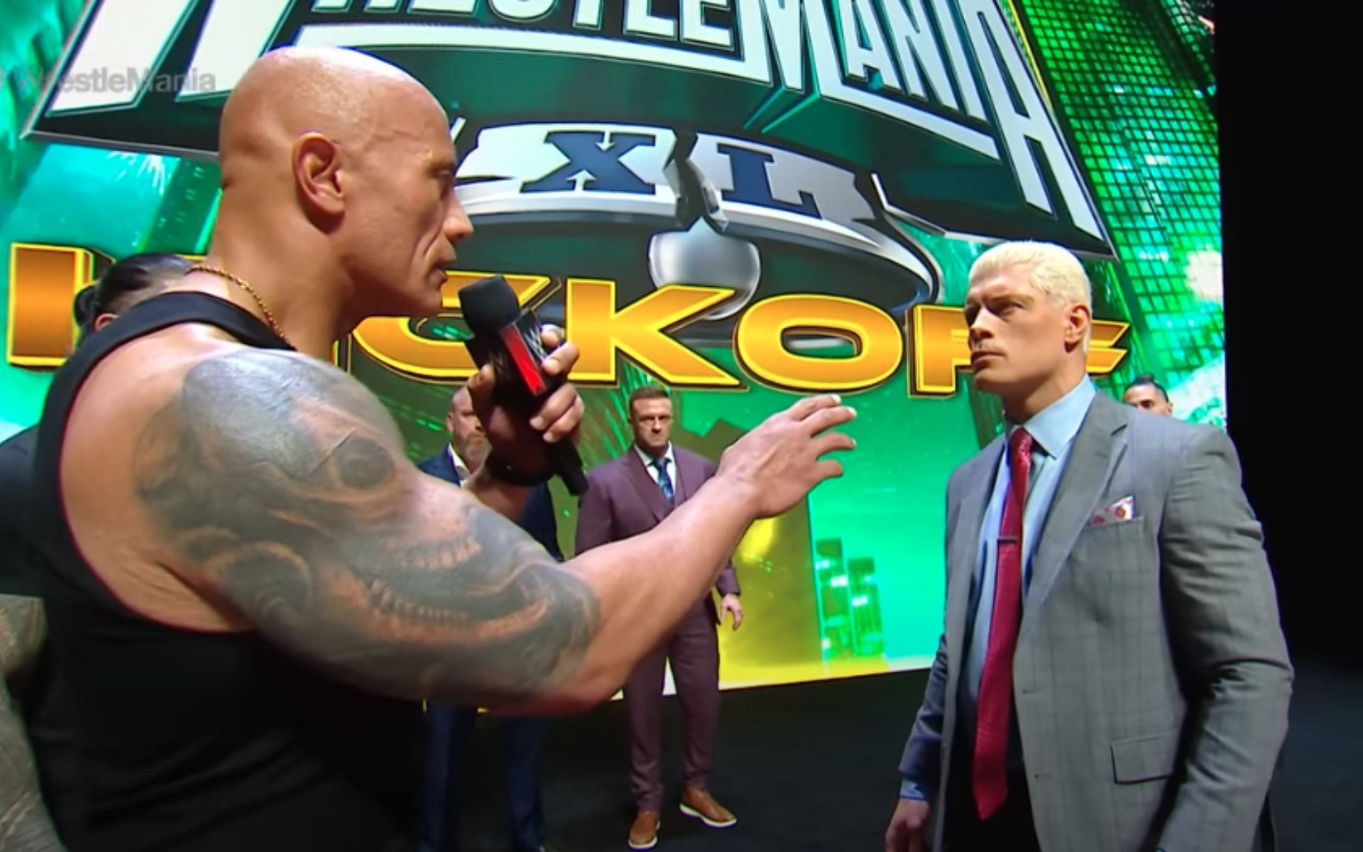 The Great One prior to slapping Cody Rhodes