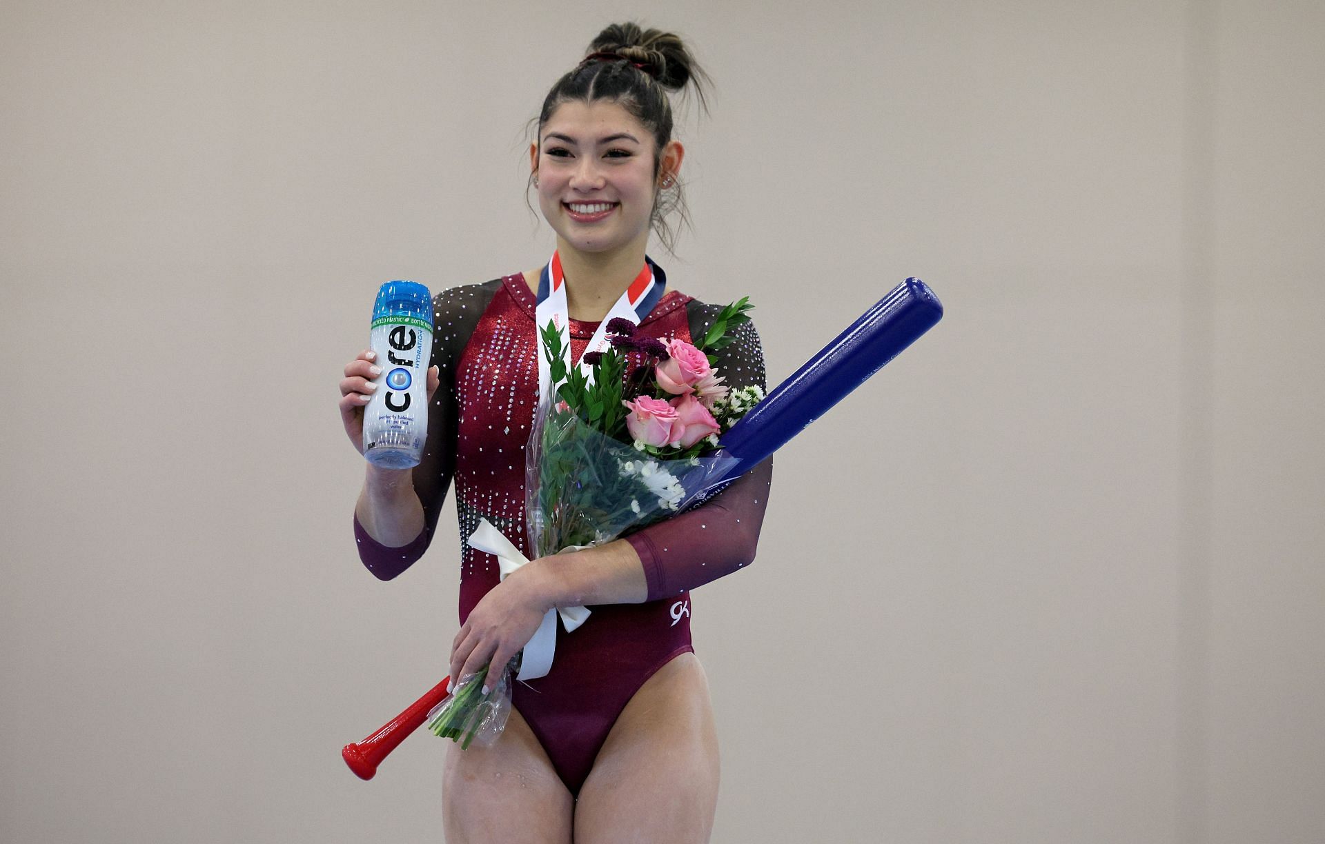 Kayla DiCello on the podium after winning the All-Around of the Senior Women at the 2024 USA Gymnastics Winter Cup at Kentucky International Convention Center in Louisville, Kentucky.