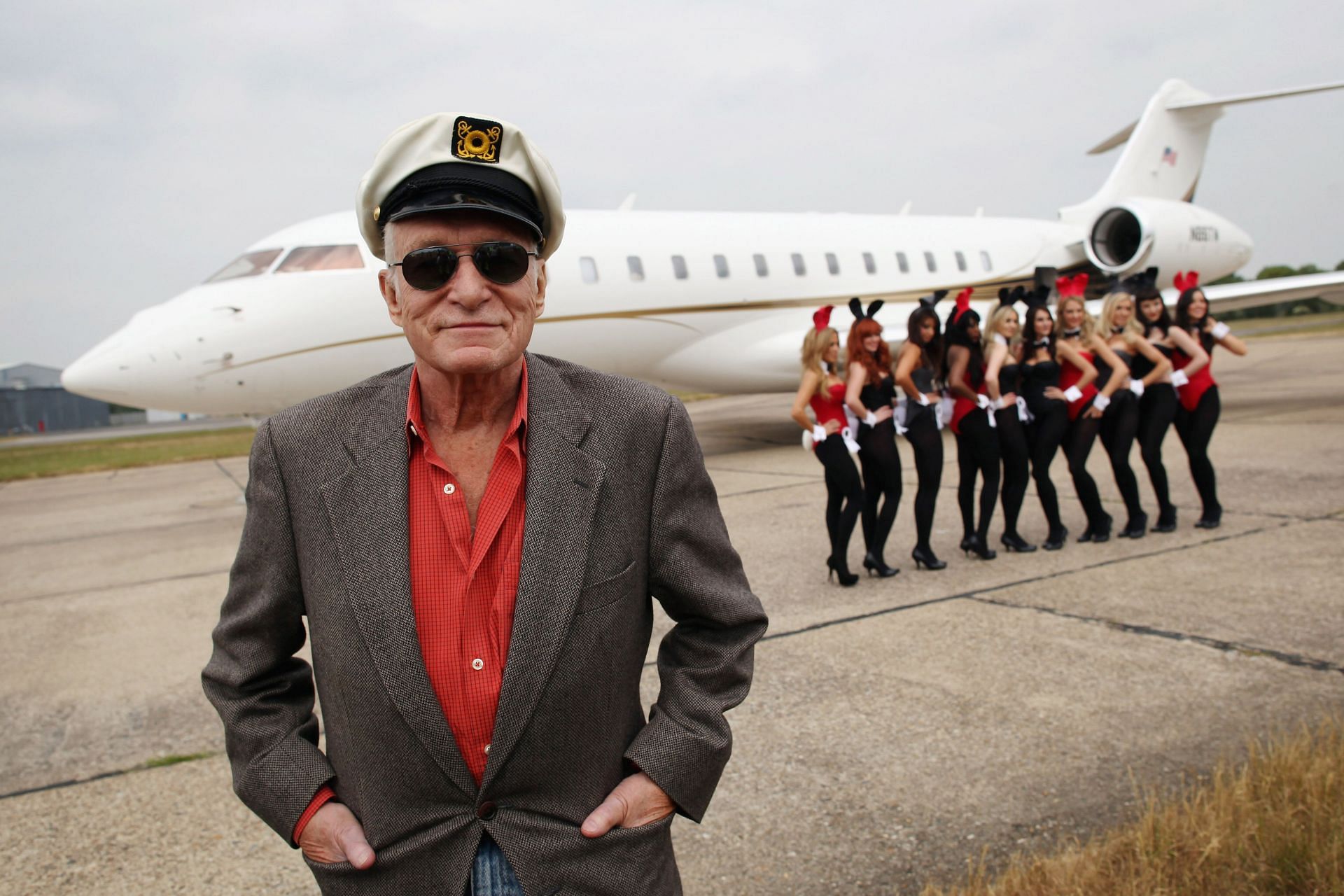 Hugh Hefner Arrives At Stansted Airport For Launch Of Playboy Club London