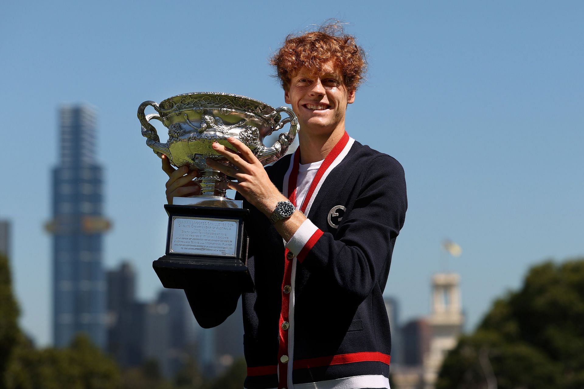 Jannik Sinner holds the Australian Open men&#039;s singles trophy.