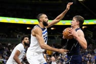 Minnesota Timberwolves star center Rudy Gobert (left)