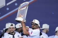 Semien celebrates with the World Series trophy