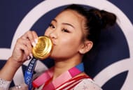 Sunisa Lee of Team United States poses with her gold medal after winning the Women's All-Around Final at the 2020 Olympic Games in Tokyo, Japan.